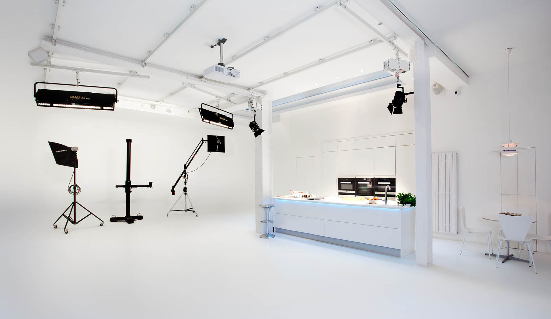 Versatile event space in Icetank with clean backdrop for workshops and presentations.