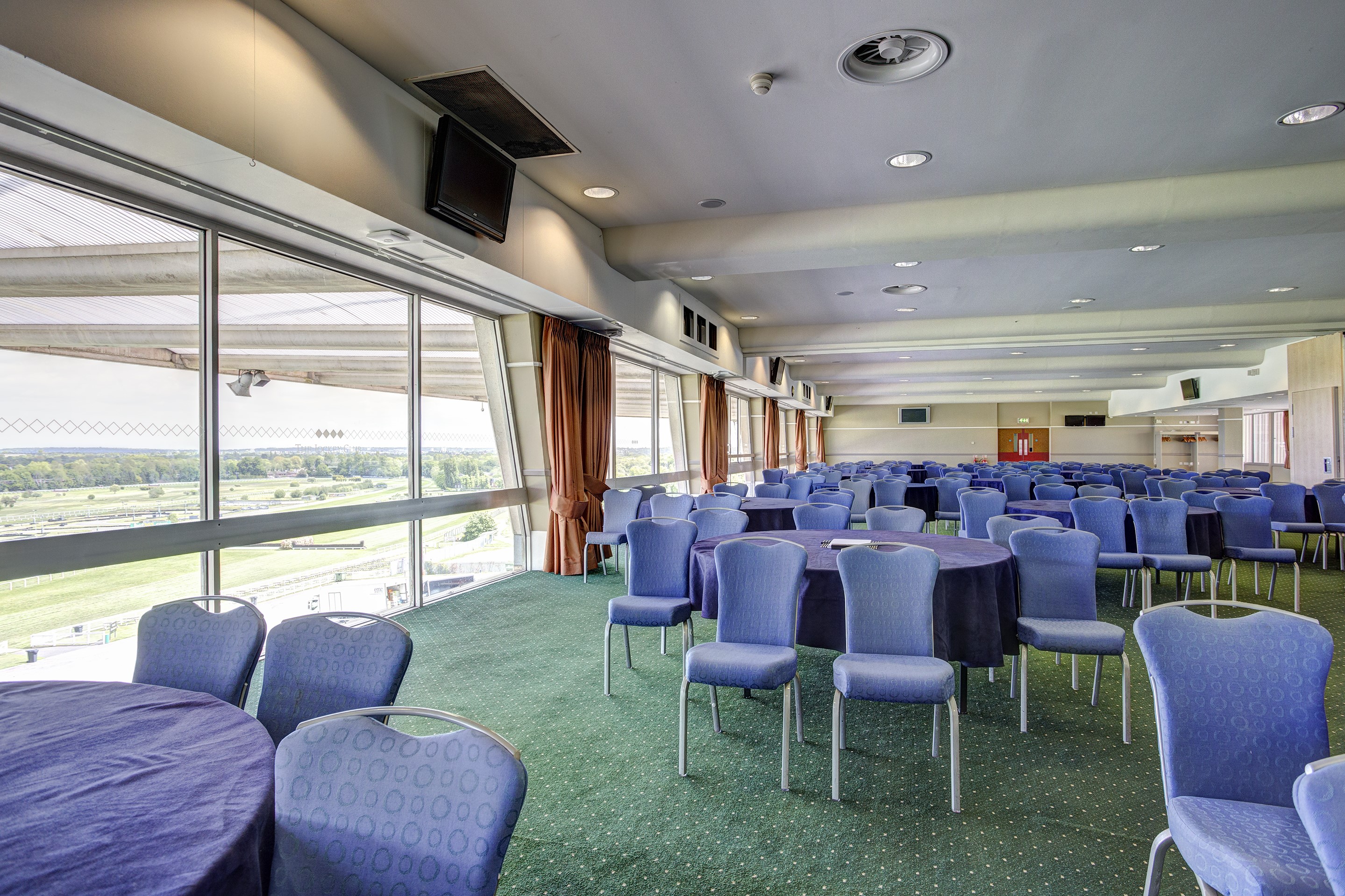 Gold Cup Suite at Sandown Park: light-filled racecourse venue for corporate conferences and galas.