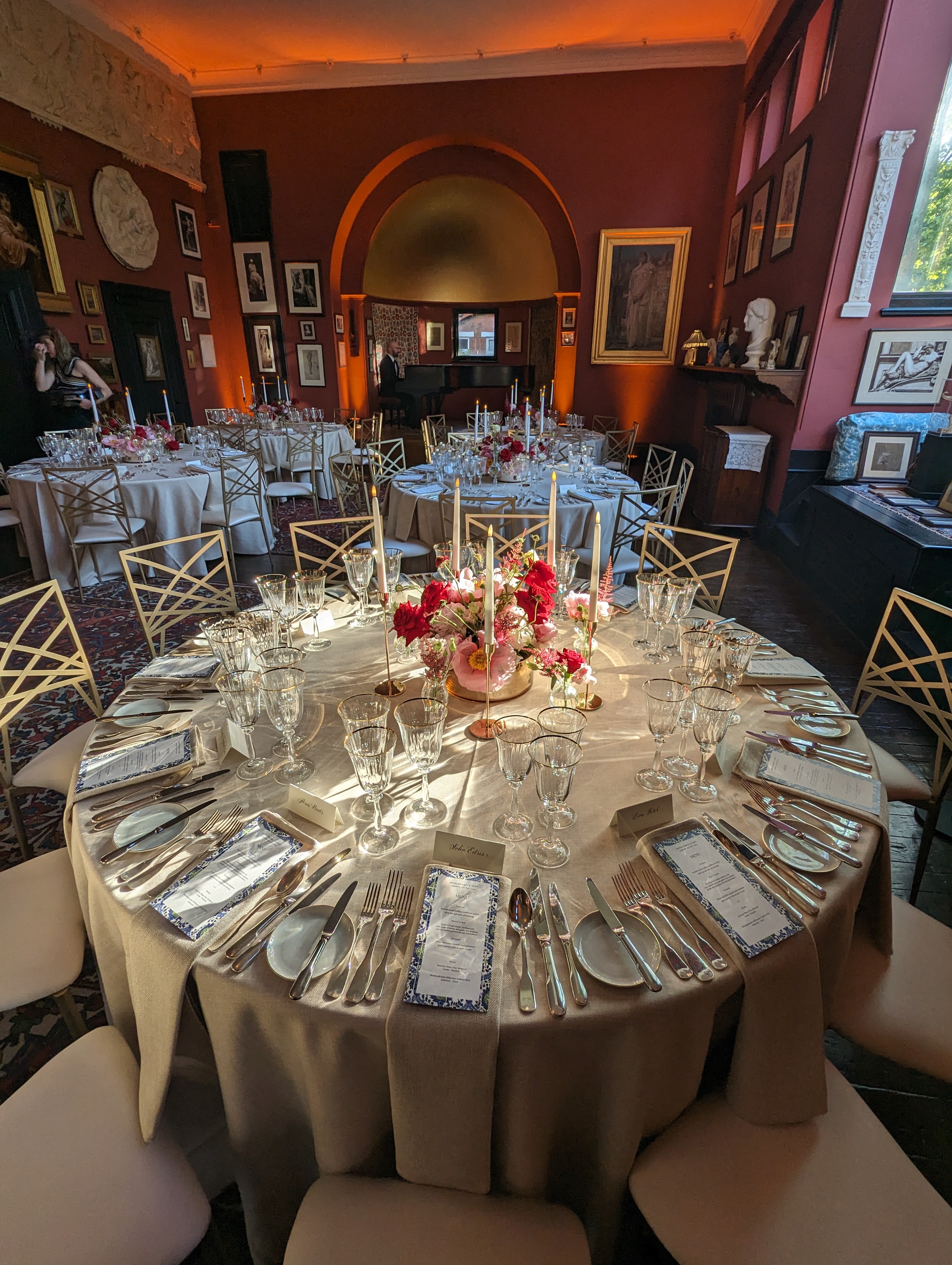 Elegant corporate reception space with round tables, perfect for formal events and celebrations.