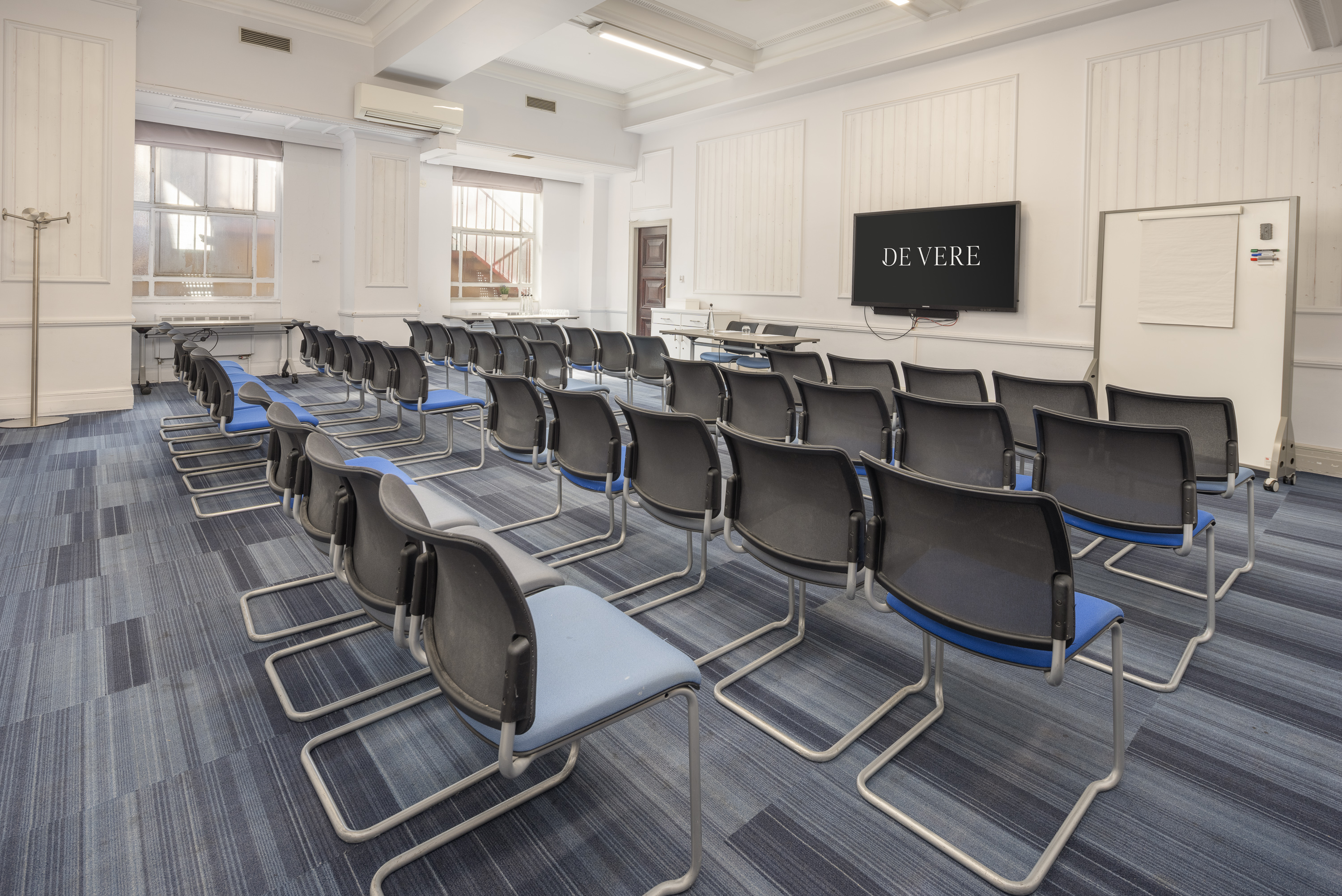 Derby Suite, Grand Connaught Rooms: theater-style meeting room for professional corporate events.