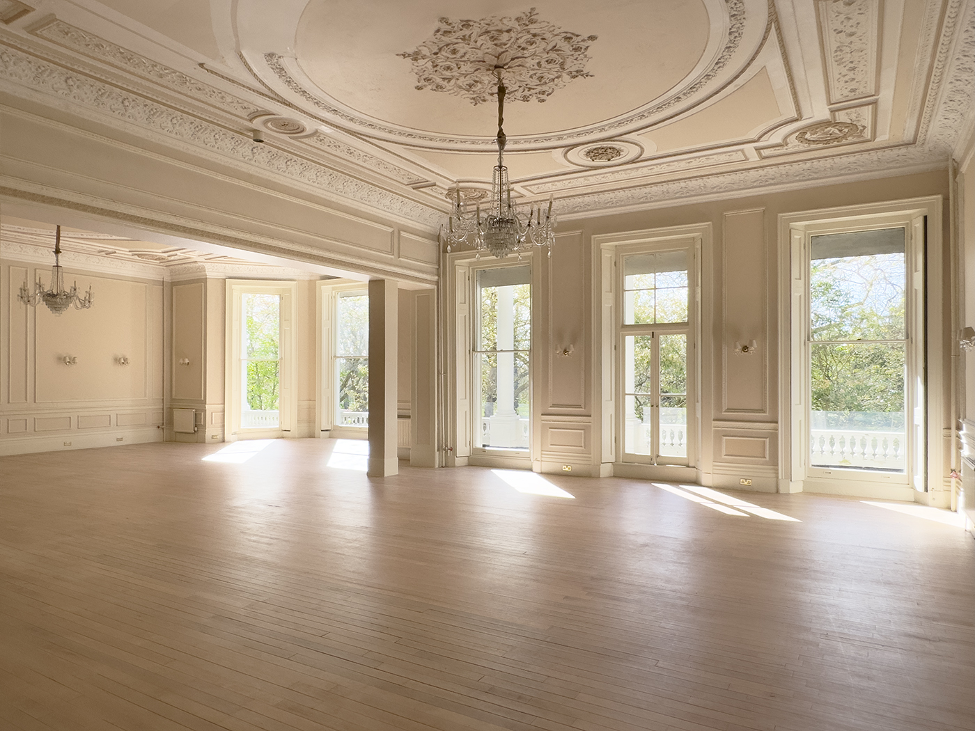 Elegant Windsor Suite venue with large windows, perfect for corporate meetings and weddings.