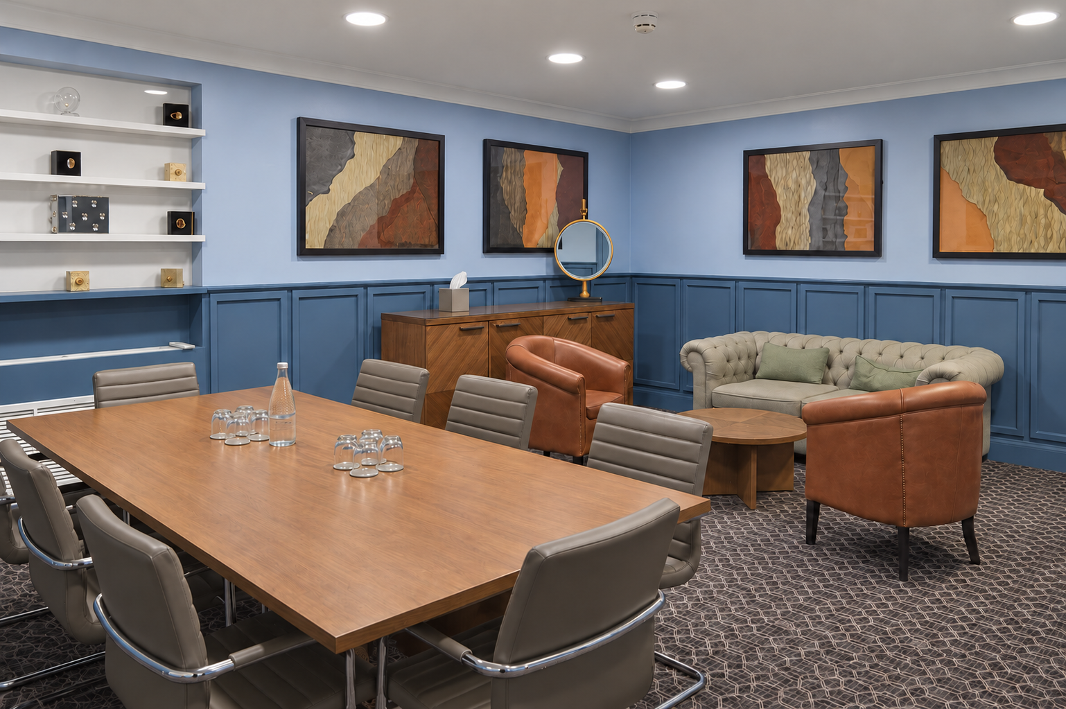 Hybrid boardroom and lounge at Grand Connaught Rooms for professional conference meetings.