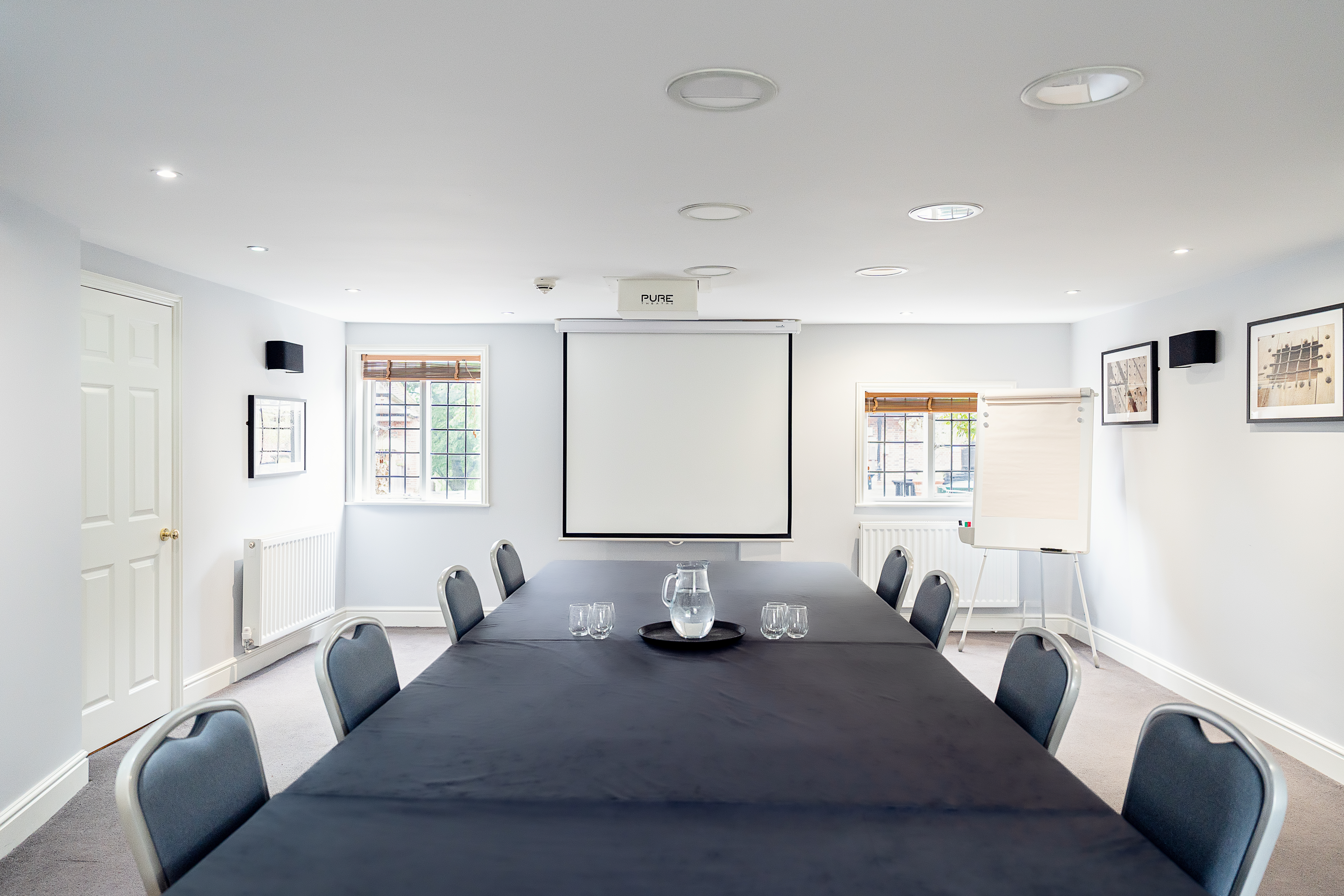 Boardroom setup in The Garden House, Leeds Castle for corporate meetings and team briefings.