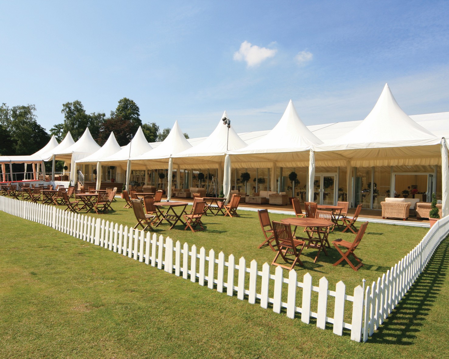 Luxury high-peak marquee at Leeds Castle for corporate hospitality and event hire.