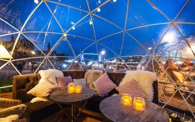 Cozy geodesic dome dining area for unique corporate events and intimate networking gatherings.