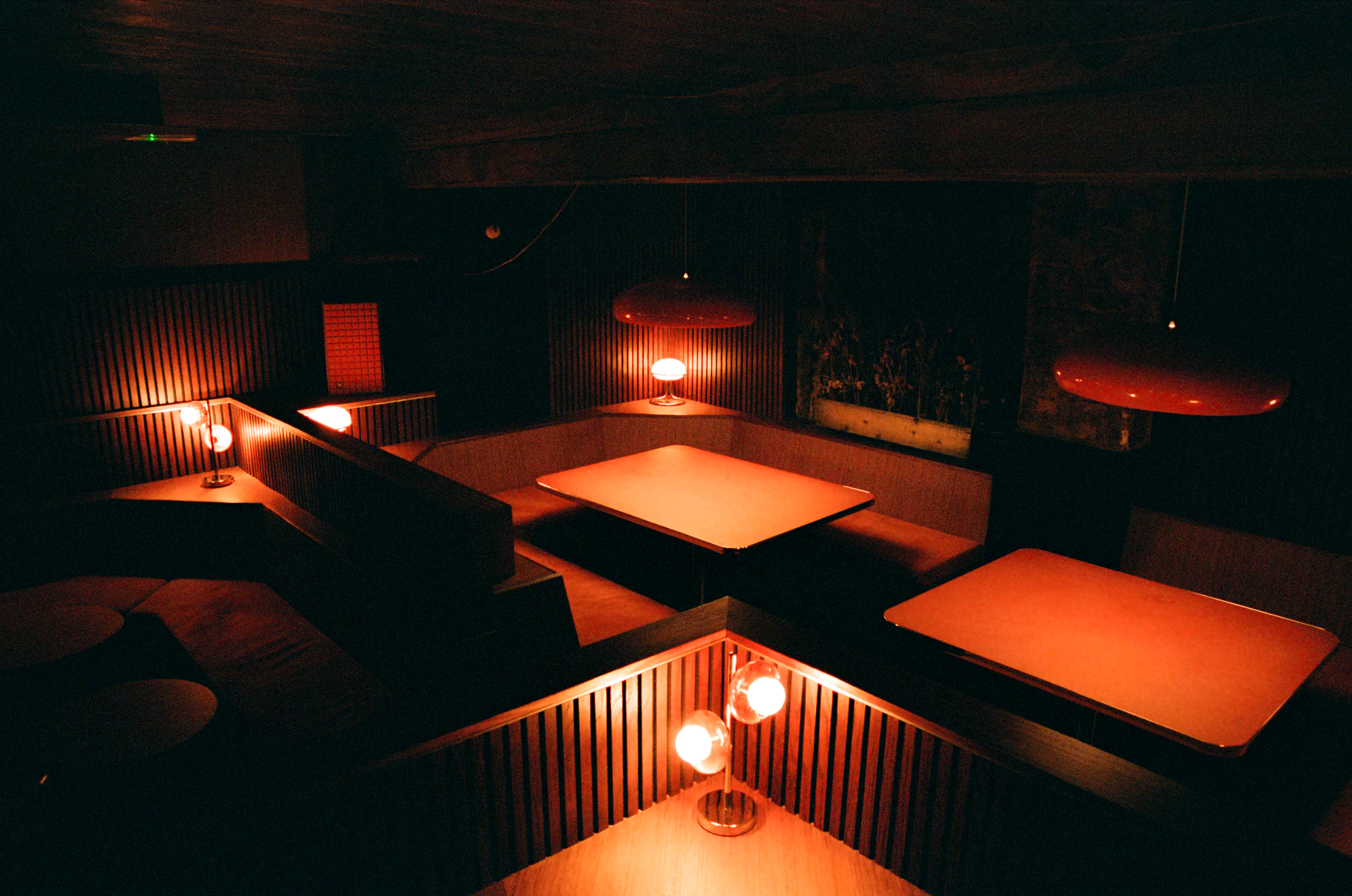 Stylish dimly lit lounge at The Marquee Moon, perfect for networking events and gatherings. - Banner