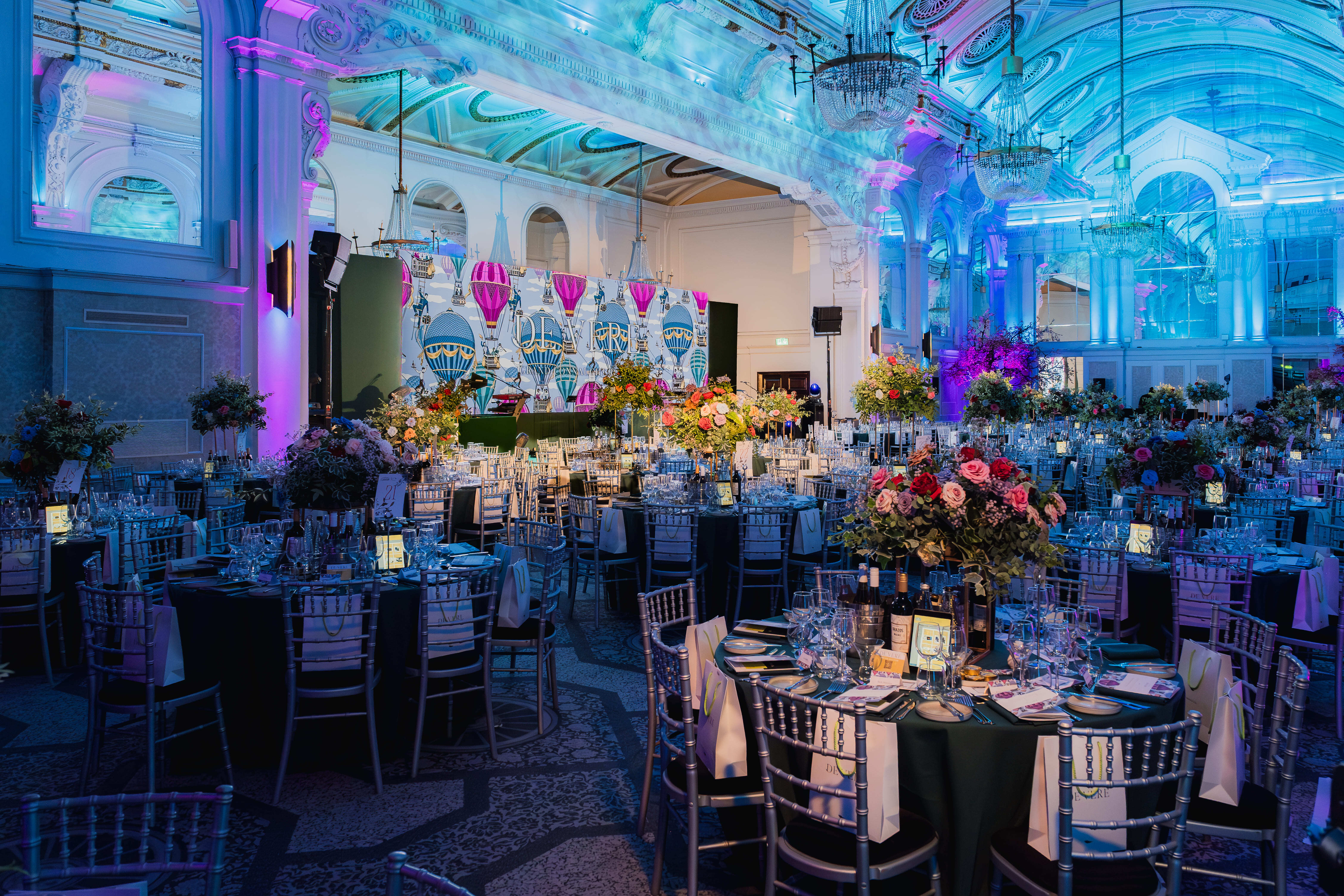 Grand Connaught Rooms gala with elegant floral centerpieces for corporate events and luxury galas.