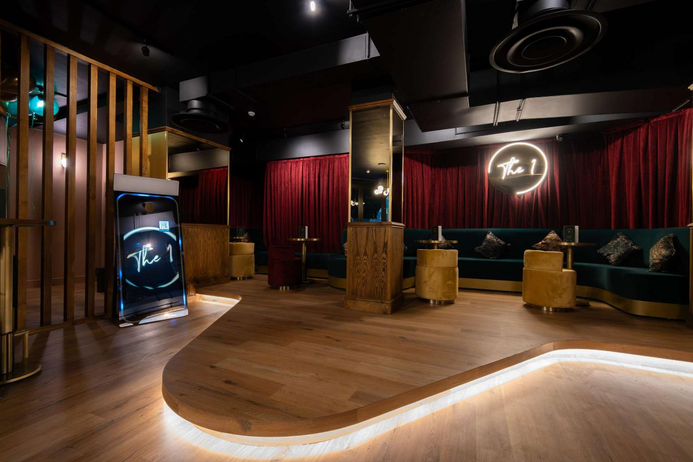 Semi-private hire area in The 1 Bar, featuring plush seating for corporate events and gatherings.