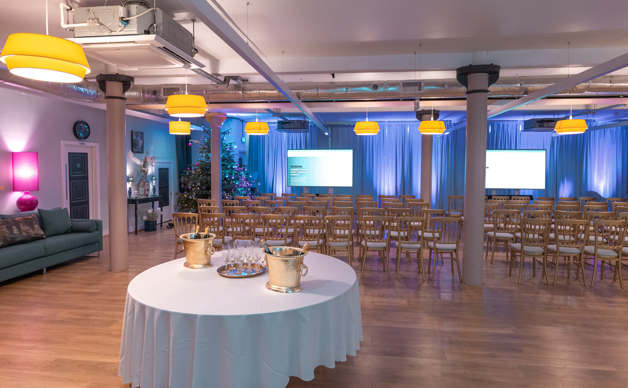 Event space at La Galeria with chairs and refreshments for presentations and networking.