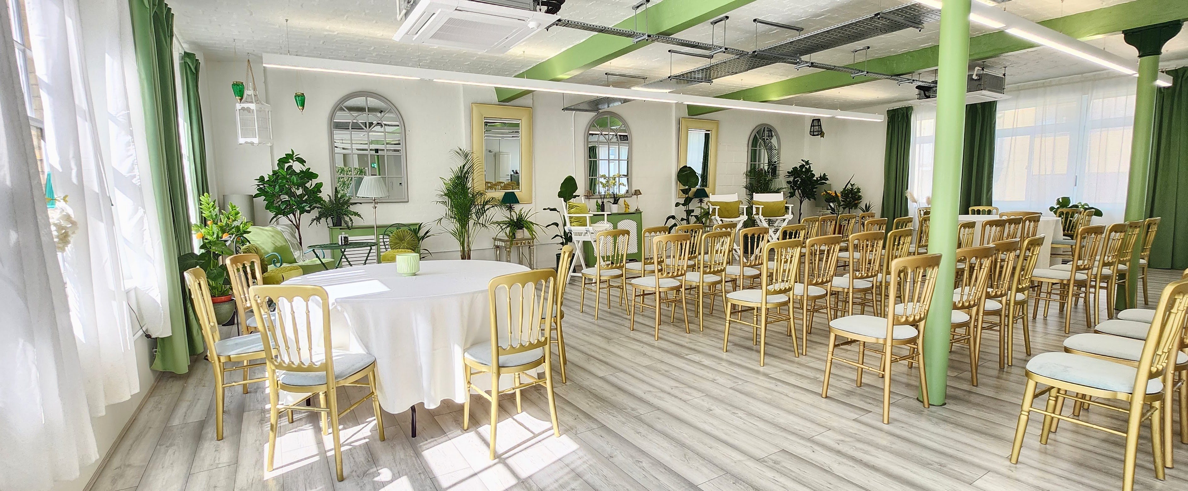 Bright meeting space in The Palm Room, featuring flexible seating for workshops and presentations.