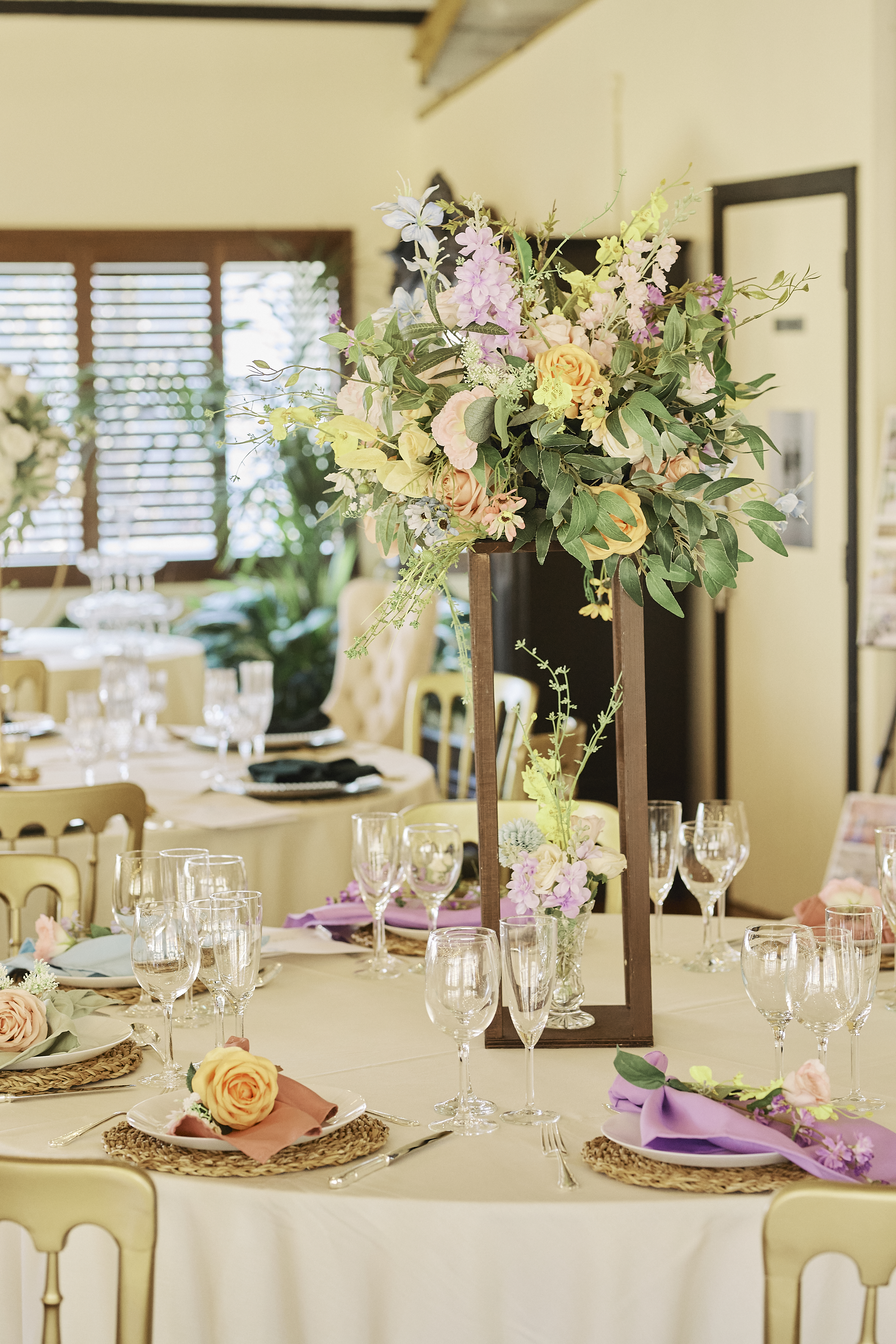 Elegant banquet setup with floral centerpieces at New Victorian Loft, Lumiere Underwood event venue.