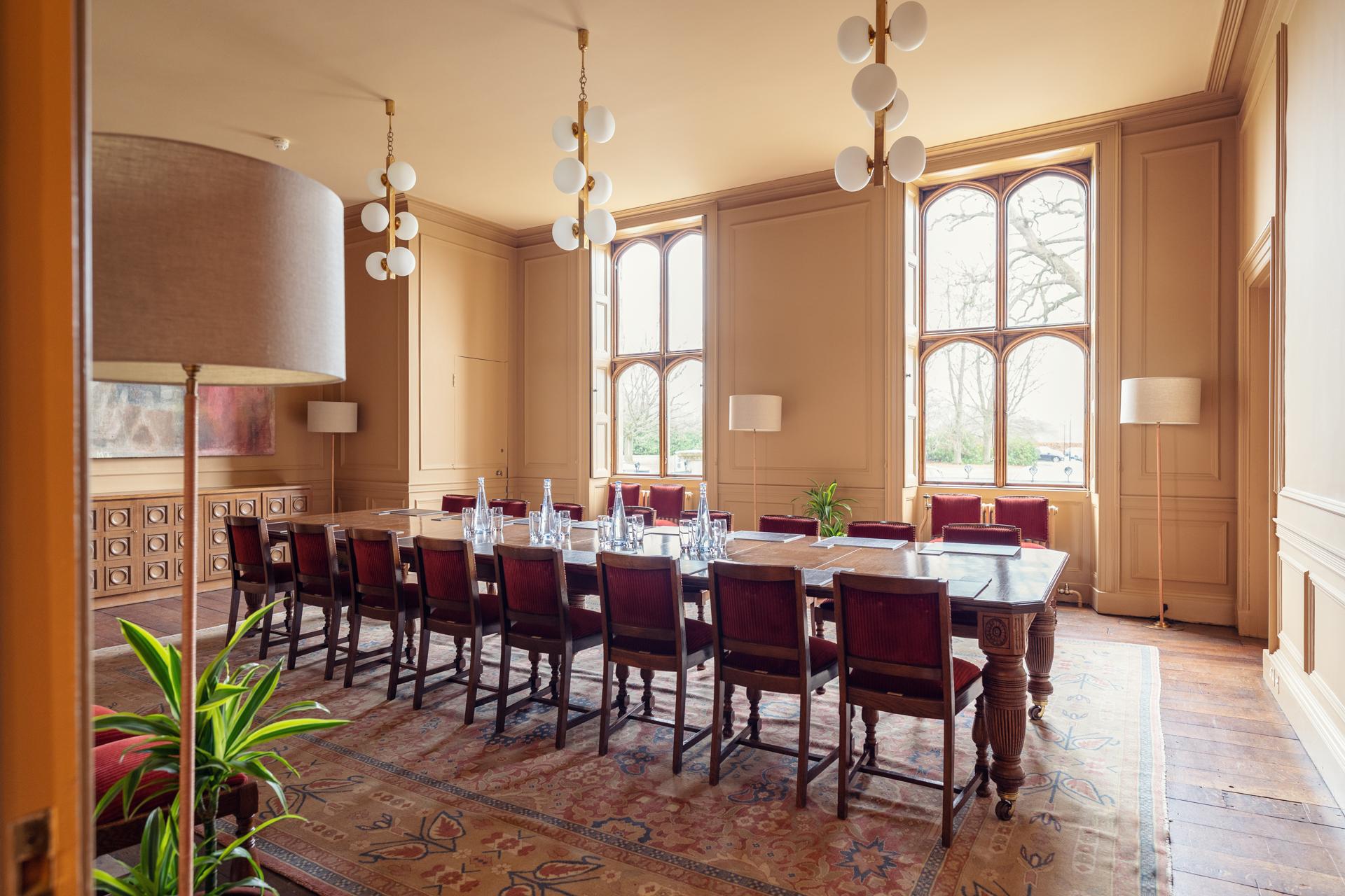 Ashridge House boardroom with heritage aesthetic for executive retreats and corporate meetings.