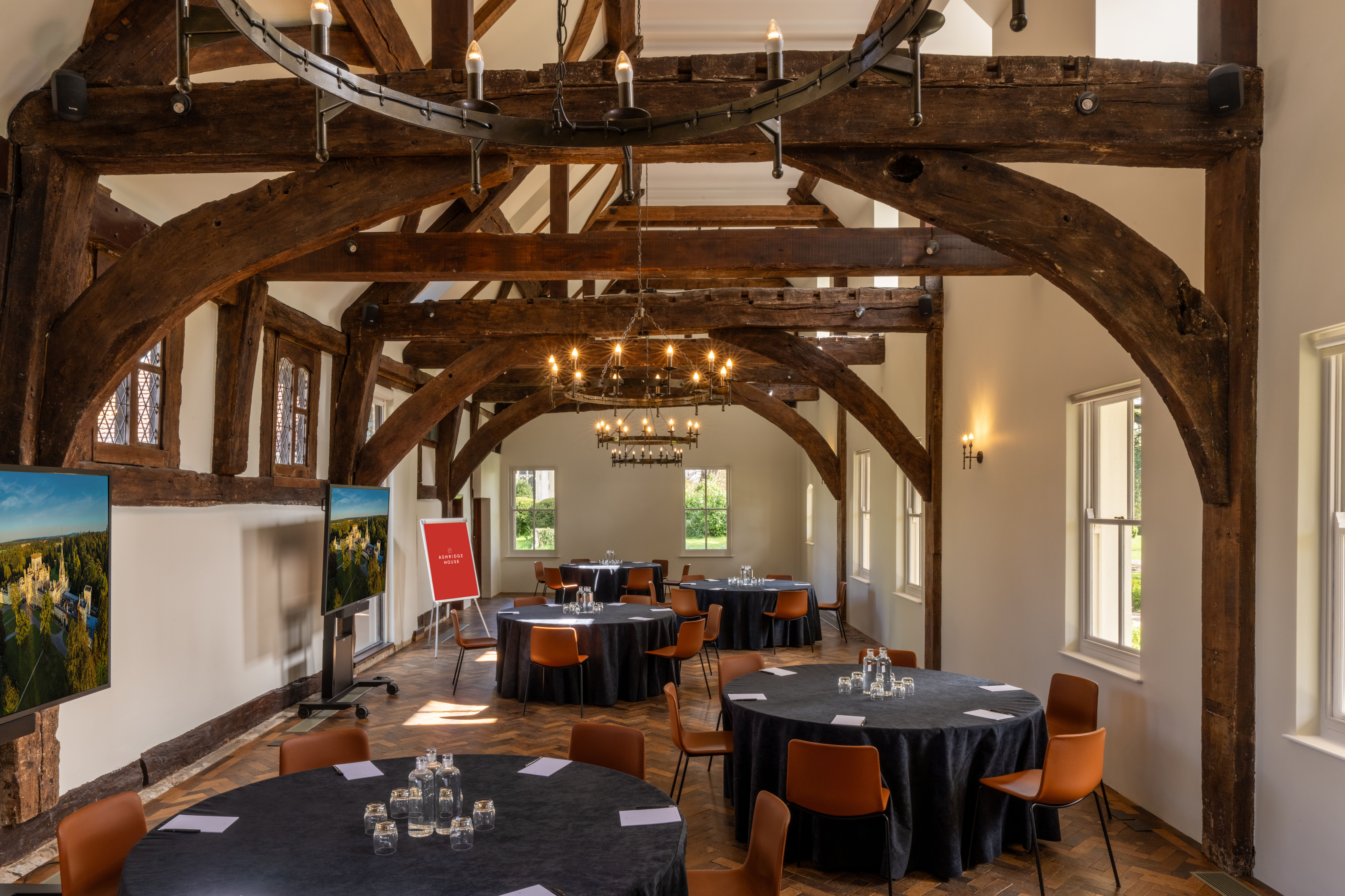 Rustic-chic Ashridge House Barn venue for corporate banquets and business conferences.