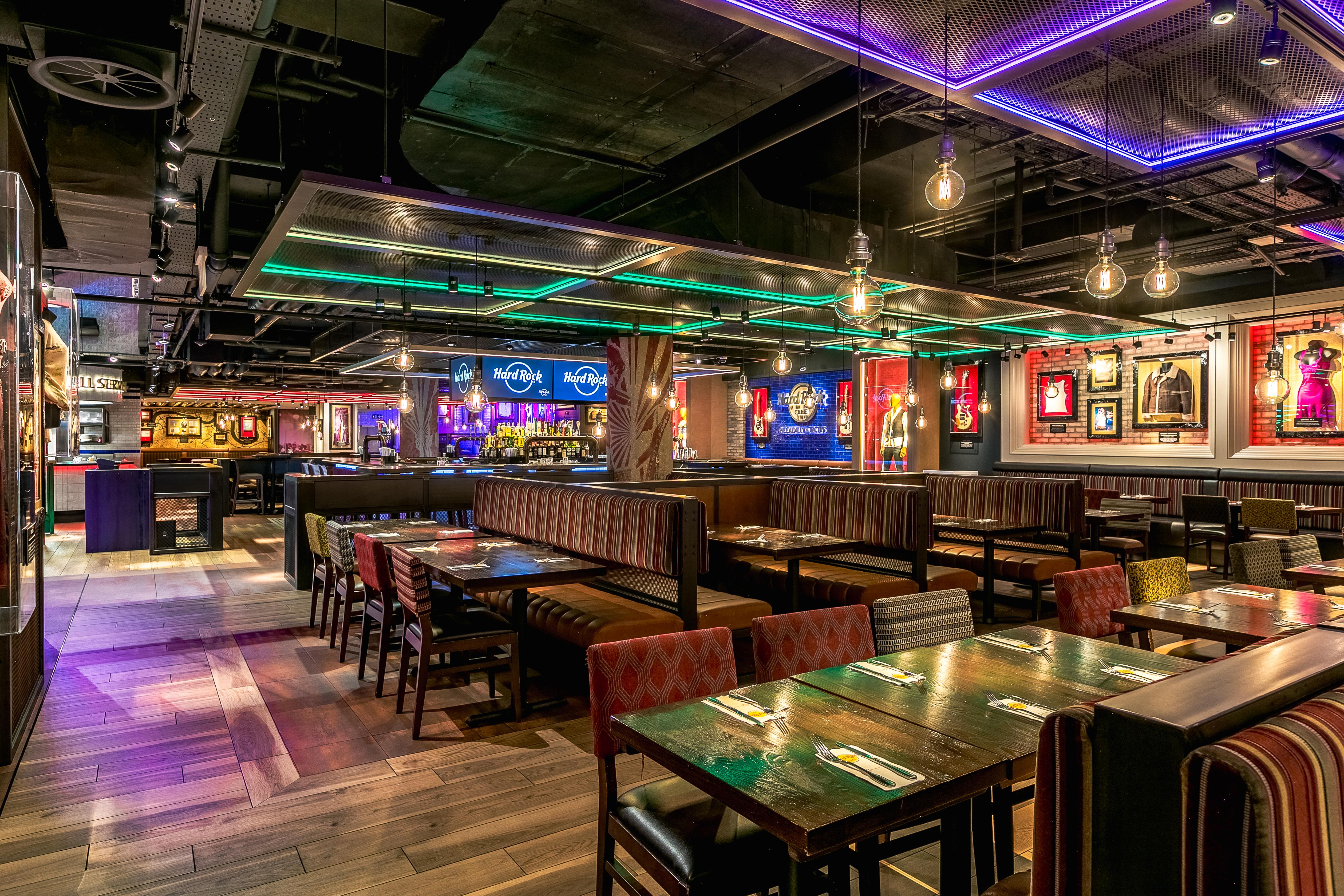 Vibrant Hard Rock Cafe Piccadilly Circus venue with spacious booths for events. - Banner