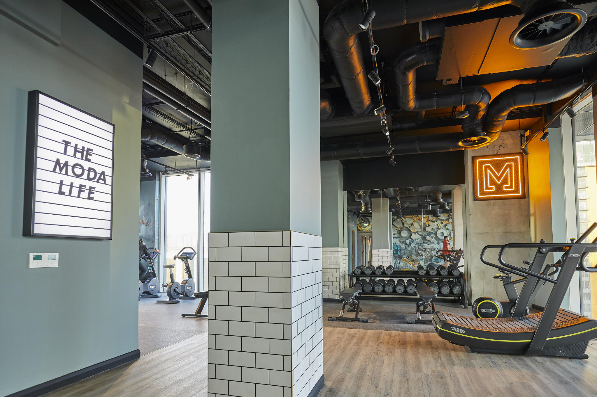 Industrial-chic gym in Angel Gardens for corporate retreats and wellness brand activations.