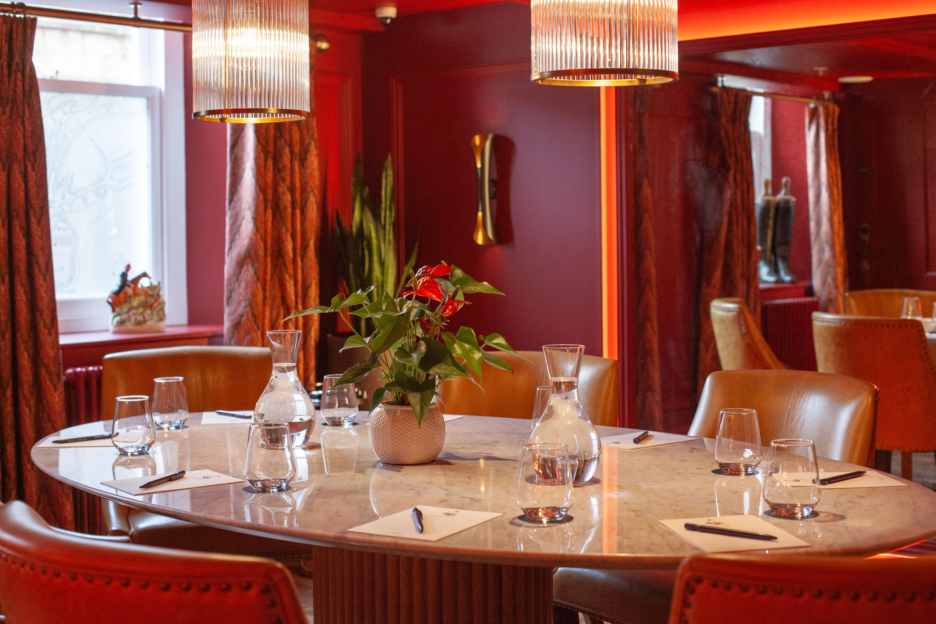 Luxury boardroom setup at Hotel Indigo Bath for private dining and executive meetings.