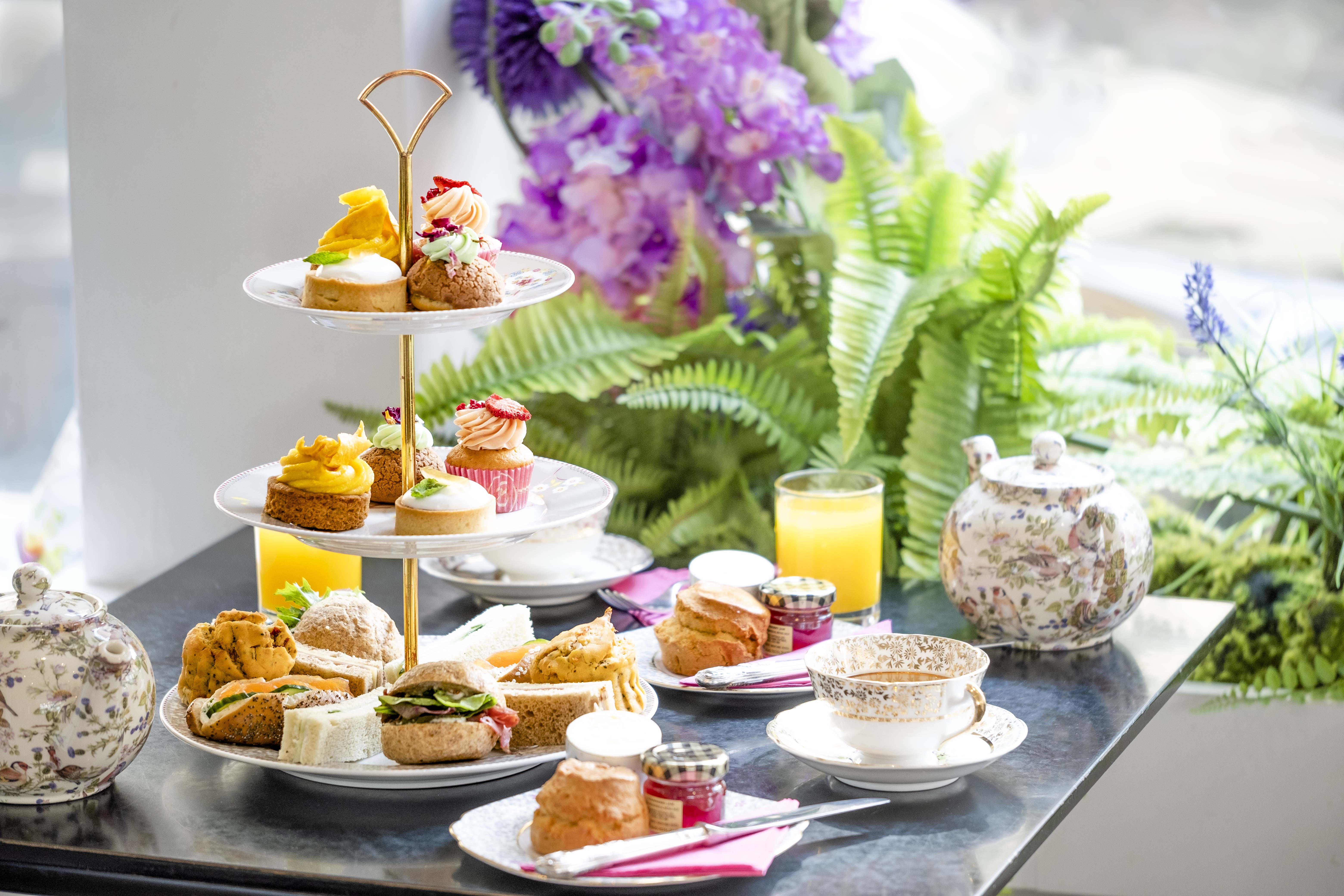 Brigit's Afternoon Tea Bus in London for luxury corporate networking and client hospitality. - Banner