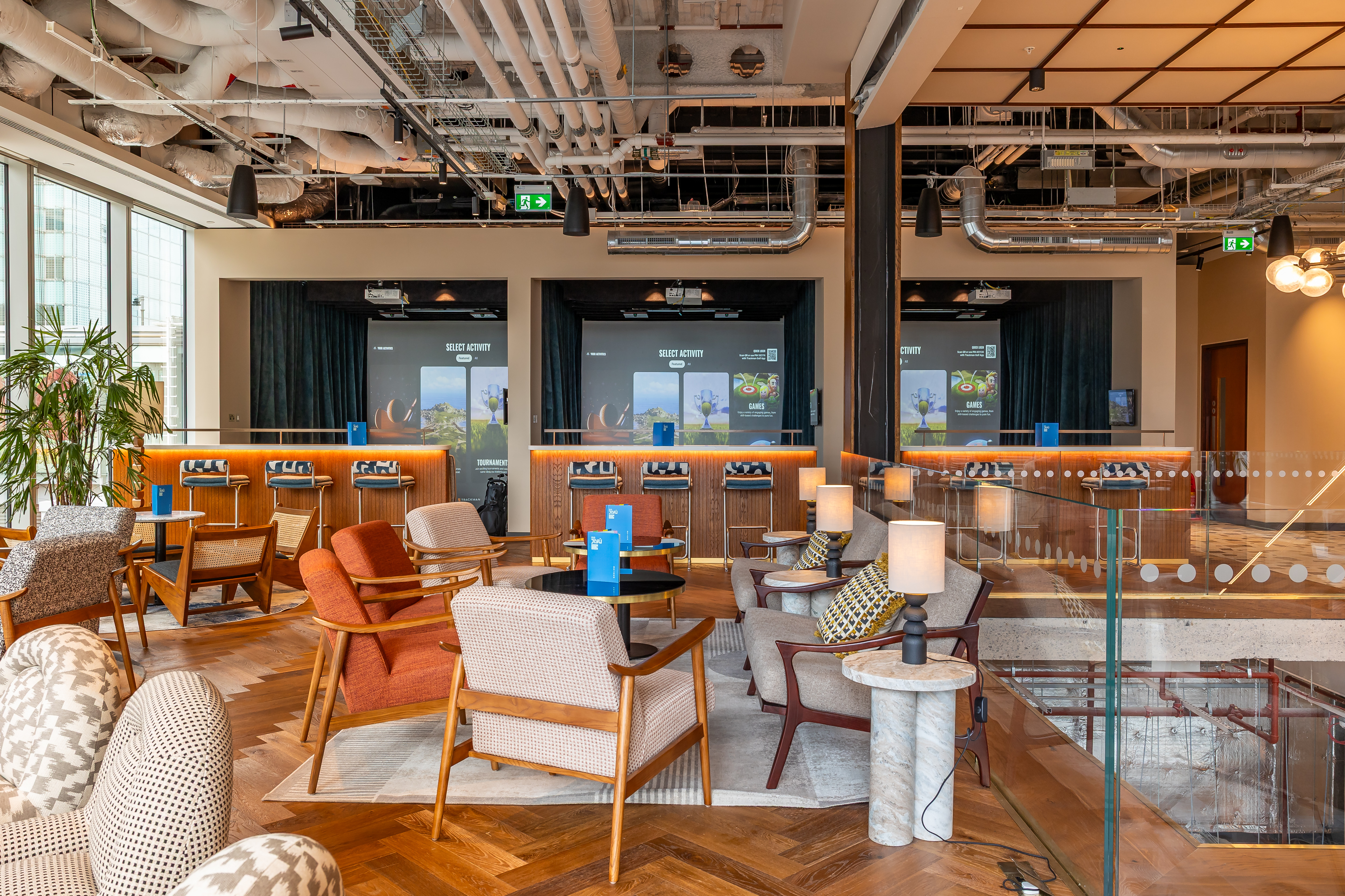 Modern breakout space with lounge seating for corporate team building and networking events.