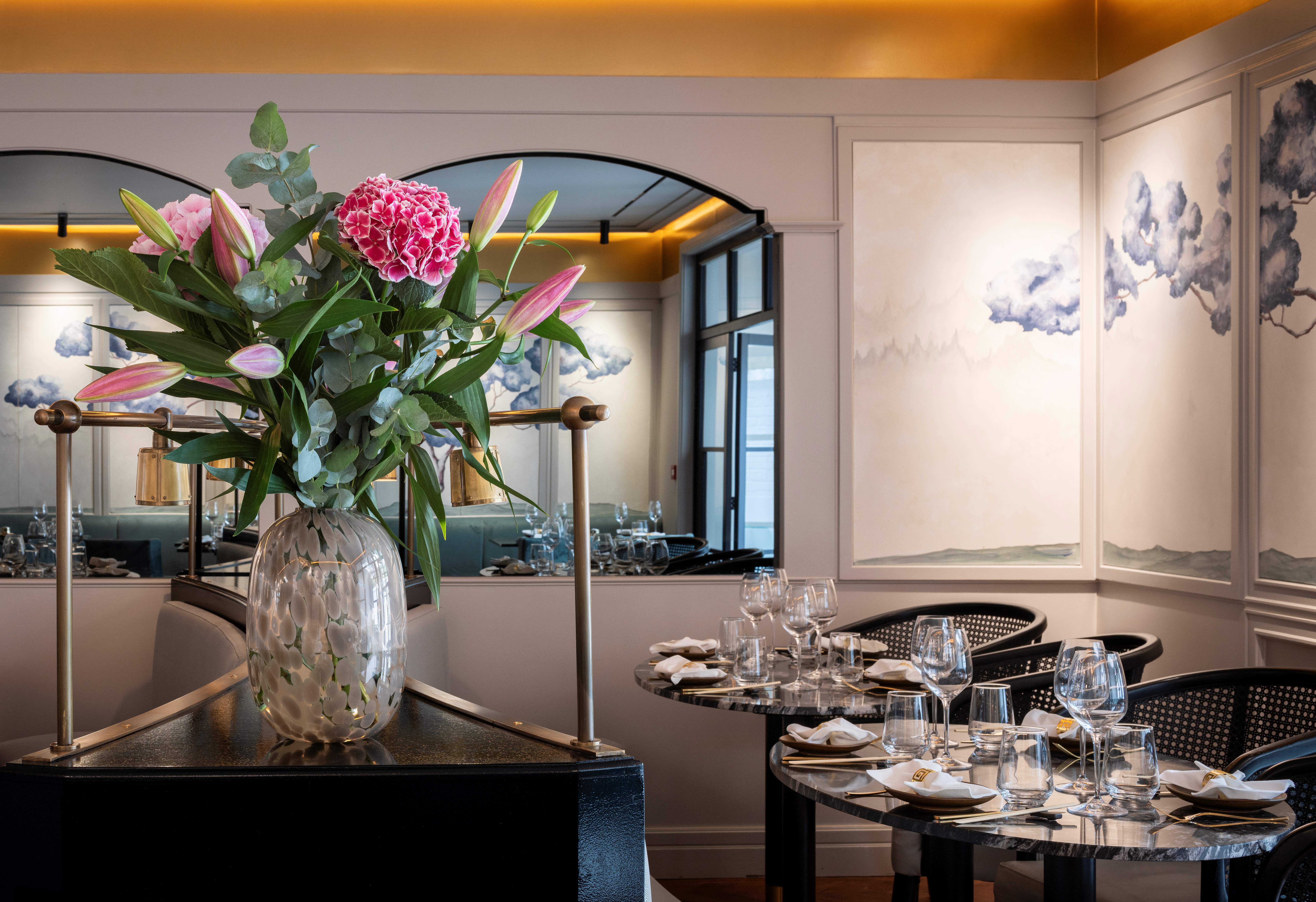 Elegant Lacquer Room dining space with floral decor, perfect for private events and executive dinners.
