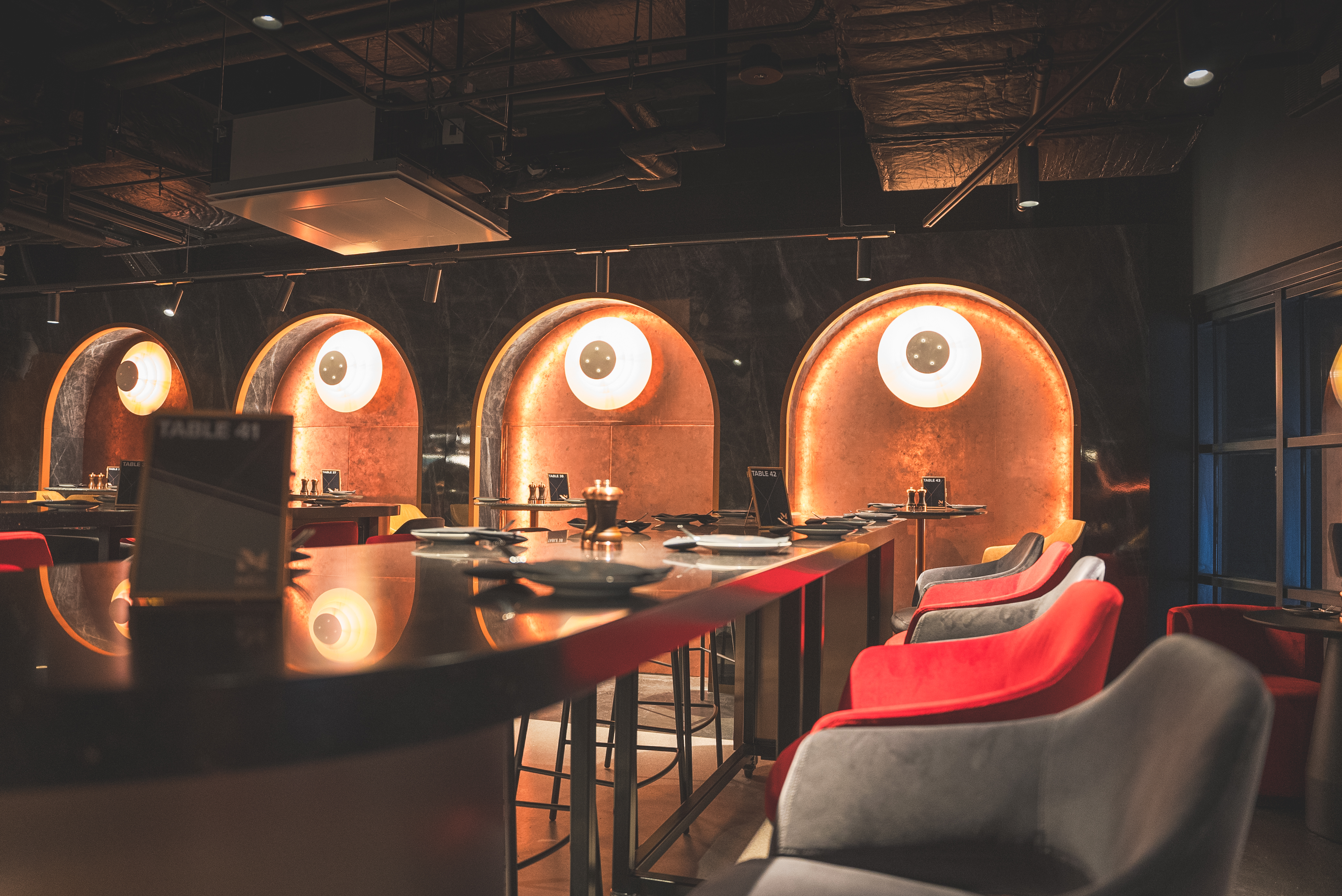 Modern dining space at The Mezz in AO Arena, ideal for intimate meetings and events.