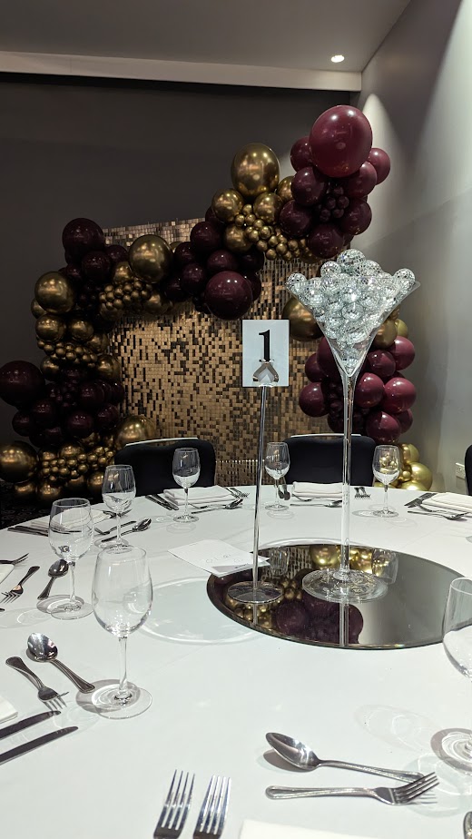 Elegant Azzurro Ballroom table setting with crystal centerpiece for upscale events. - Banner