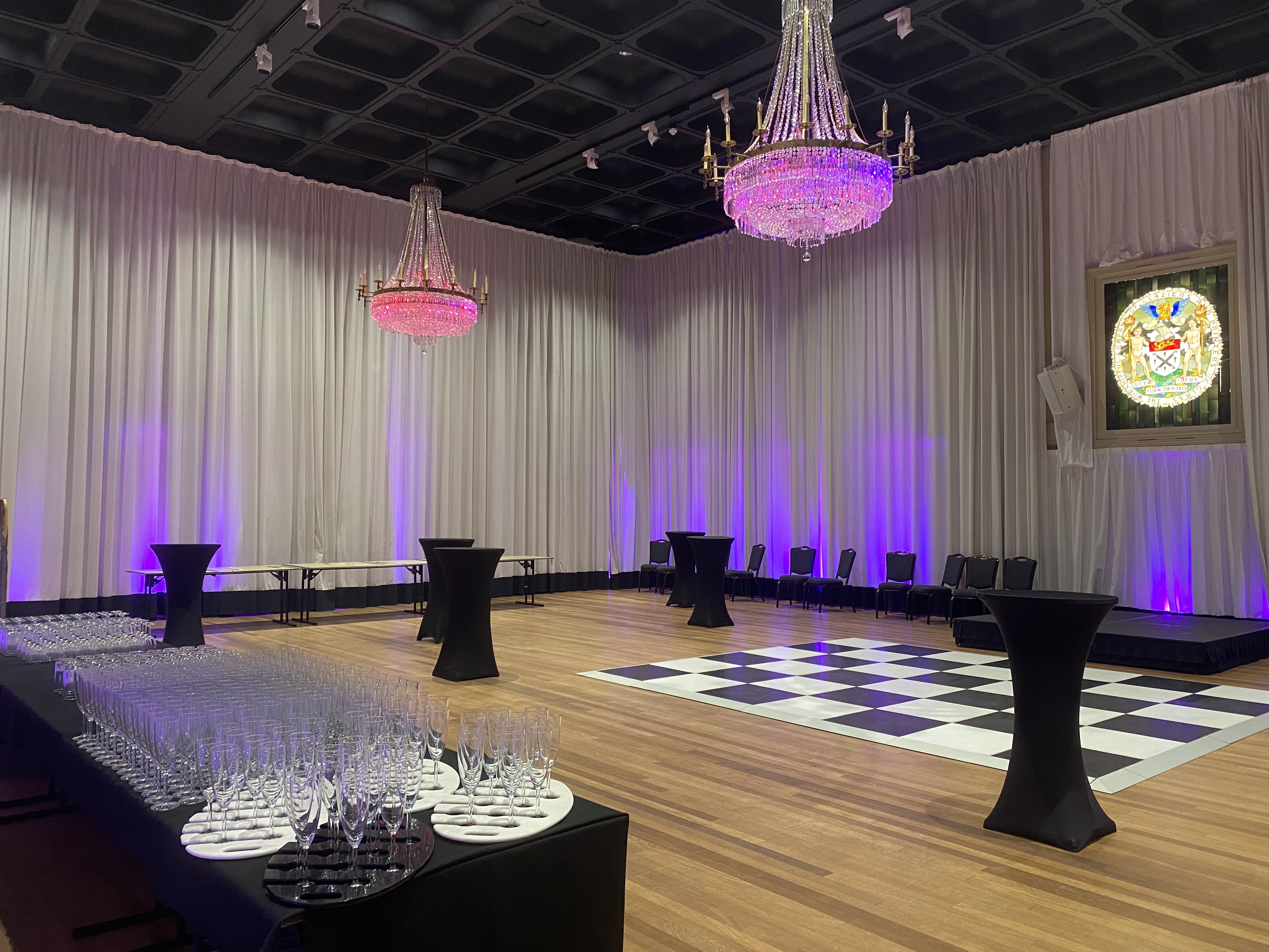 Banqueting Hall in Glaziers Hall, featuring luxurious chandeliers for upscale events. - Banner