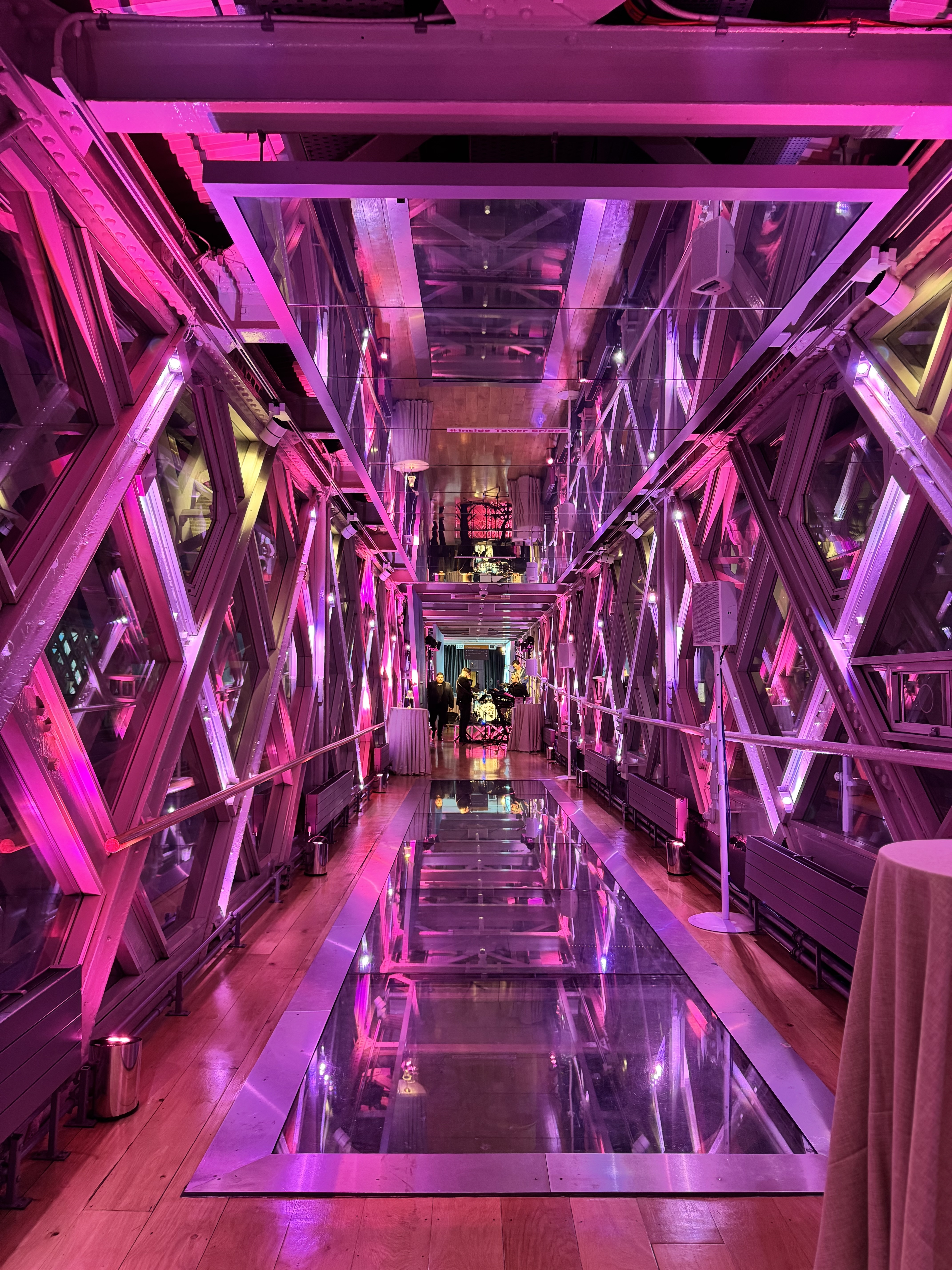 Sleek event space at HM Tower of London with pink lighting for meetings and celebrations. - Banner