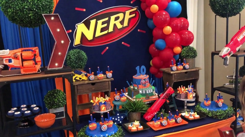 Branded event activation with tiered product displays for immersive corporate parties.