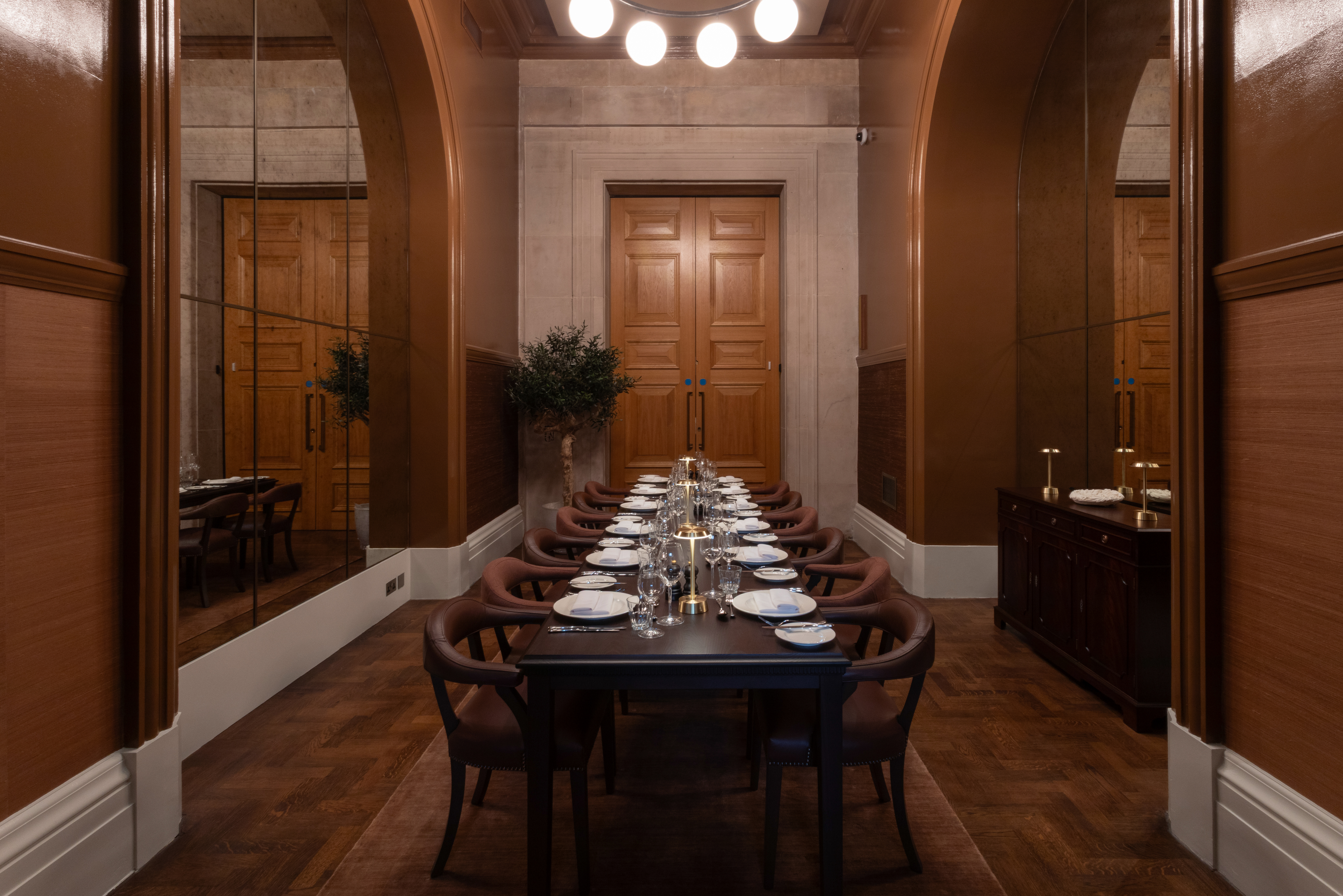Supporters' House dining room at National Gallery, elegant setting for intimate gatherings.
