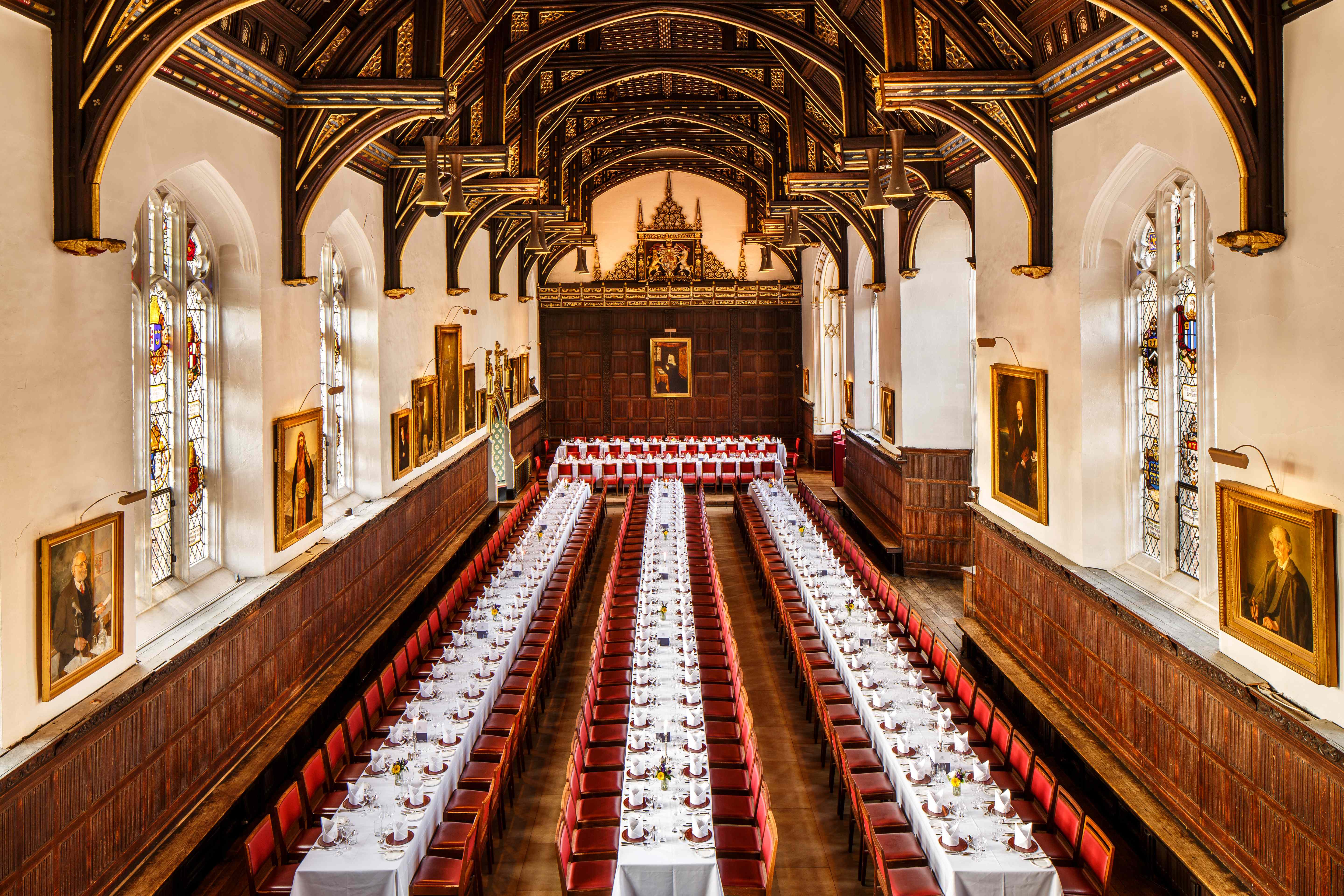 Historic St John's College Hall with banquet layout for formal dinners and corporate events.