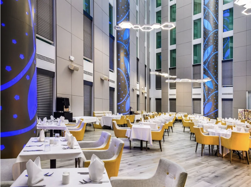 Heathrow Atrium Hotel networking event, modern space - Banner