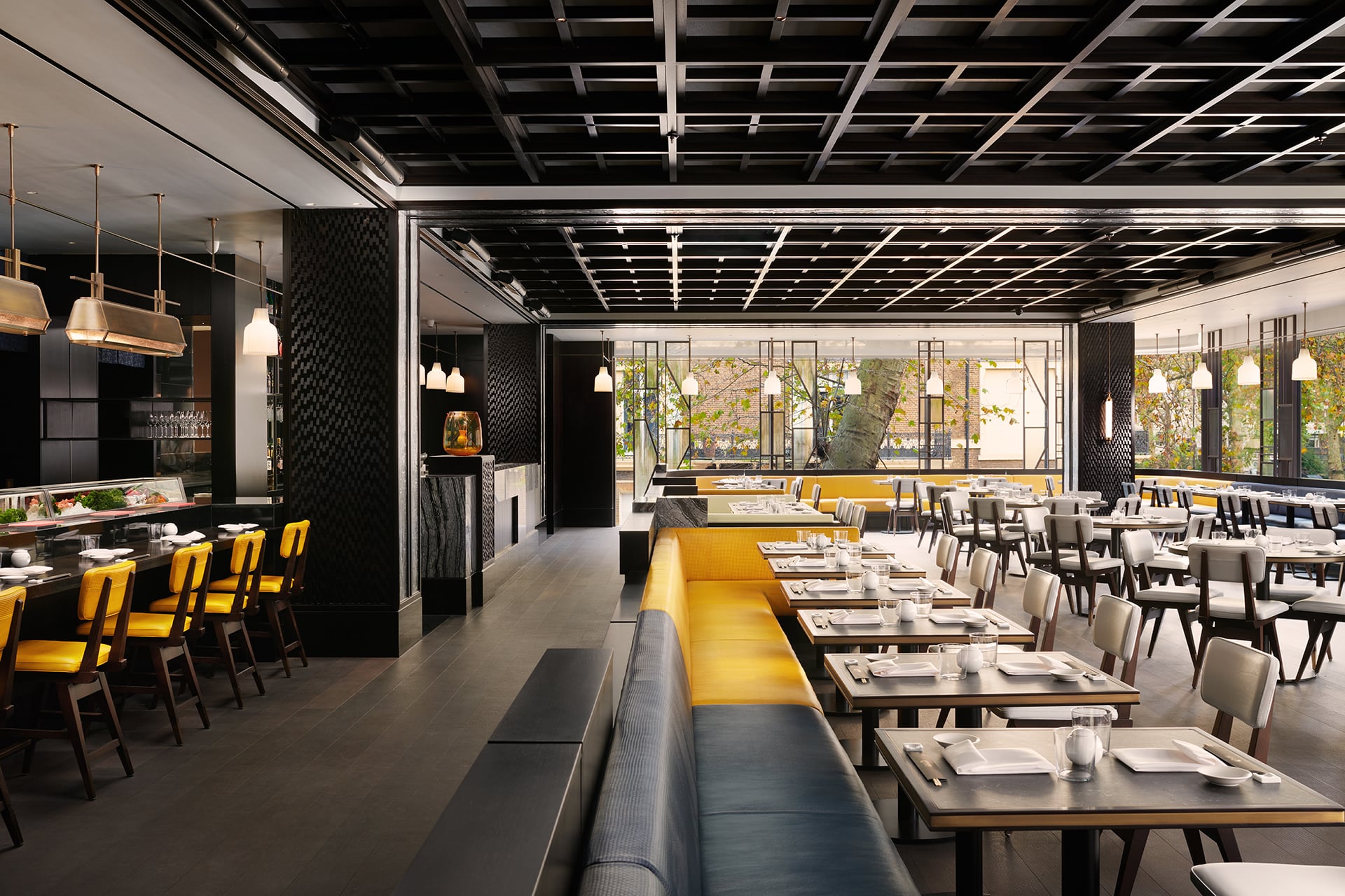 Nobu London White Room: Elegant banquette seating for corporate dinners and networking events. - Banner