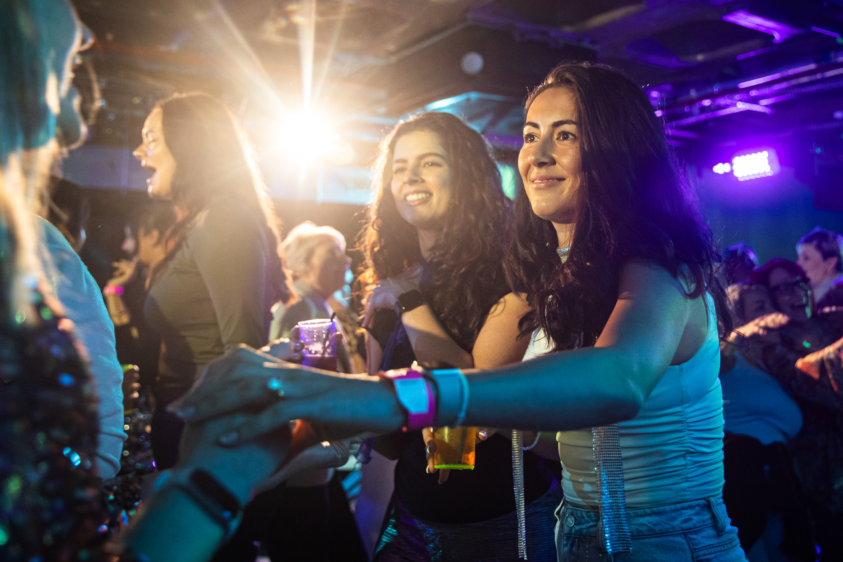 Networking at Big Belly Room comedy club, atmospheric event space for corporate receptions.