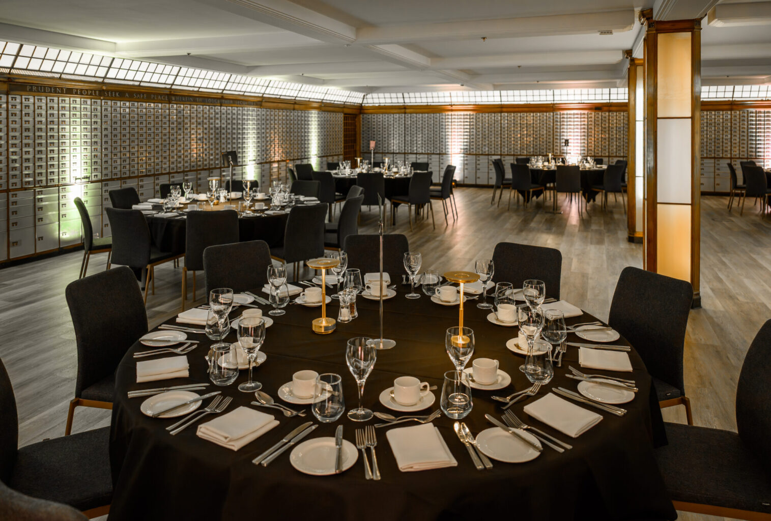Bank vault gala space with ambient lighting for corporate events and experiential gatherings. - Banner