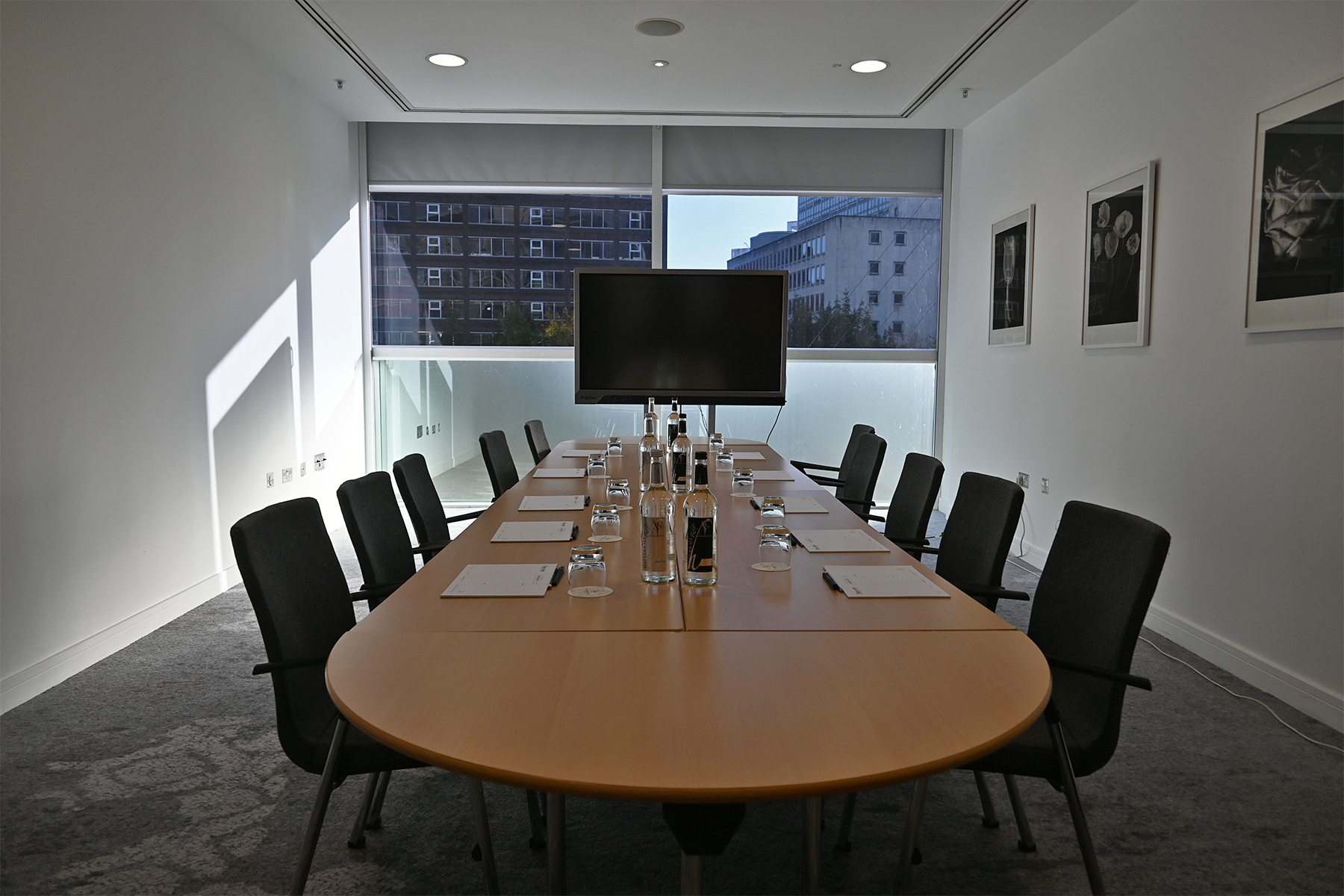 Boardroom setup in The Lowry Hotel Meeting Room 6 for corporate meetings and business conferences.