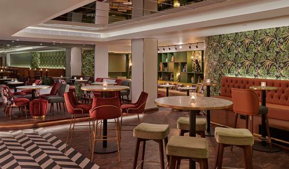 Leaf & Cane lounge at Hyatt Regency London: tropical-chic venue for networking and cocktail events.