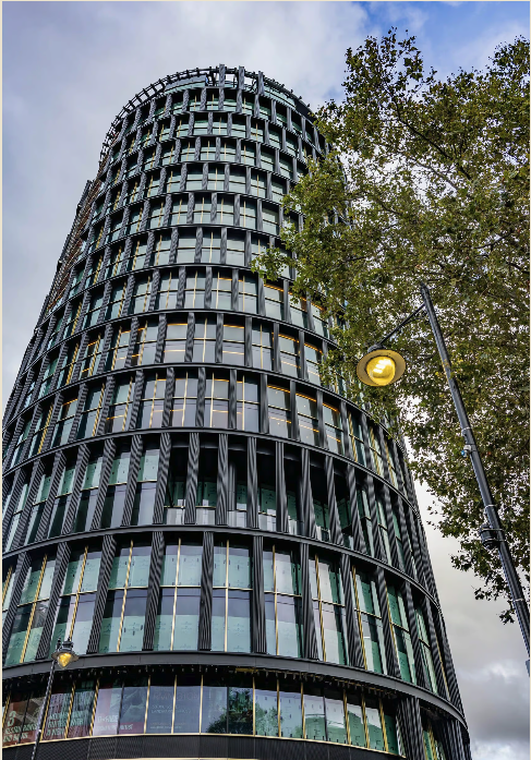 Art'otel London Hoxton skyscraper: modern curved facade for corporate meetings and executive events.
