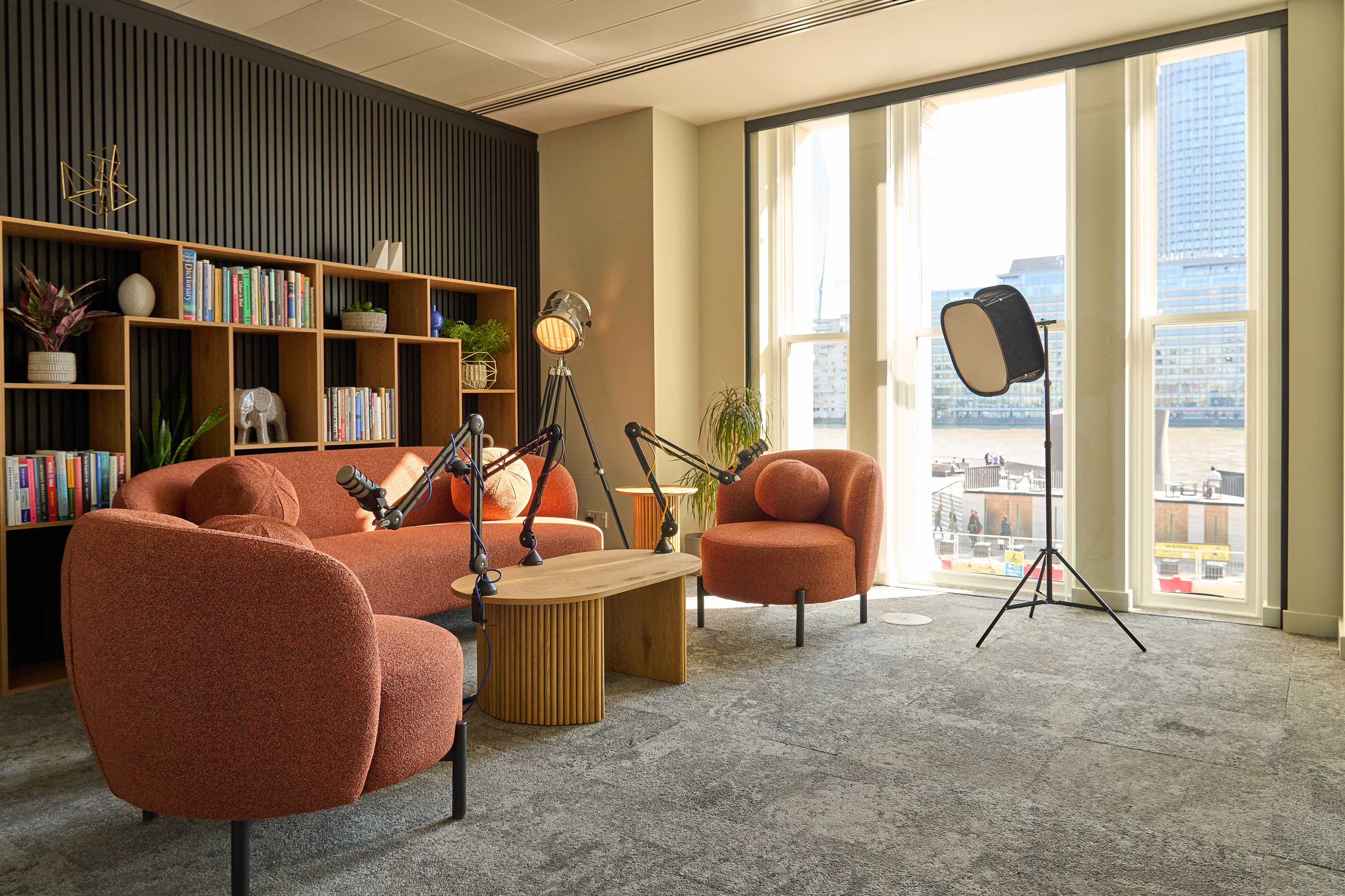 Modern podcast studio with professional AV for small group breakout sessions.