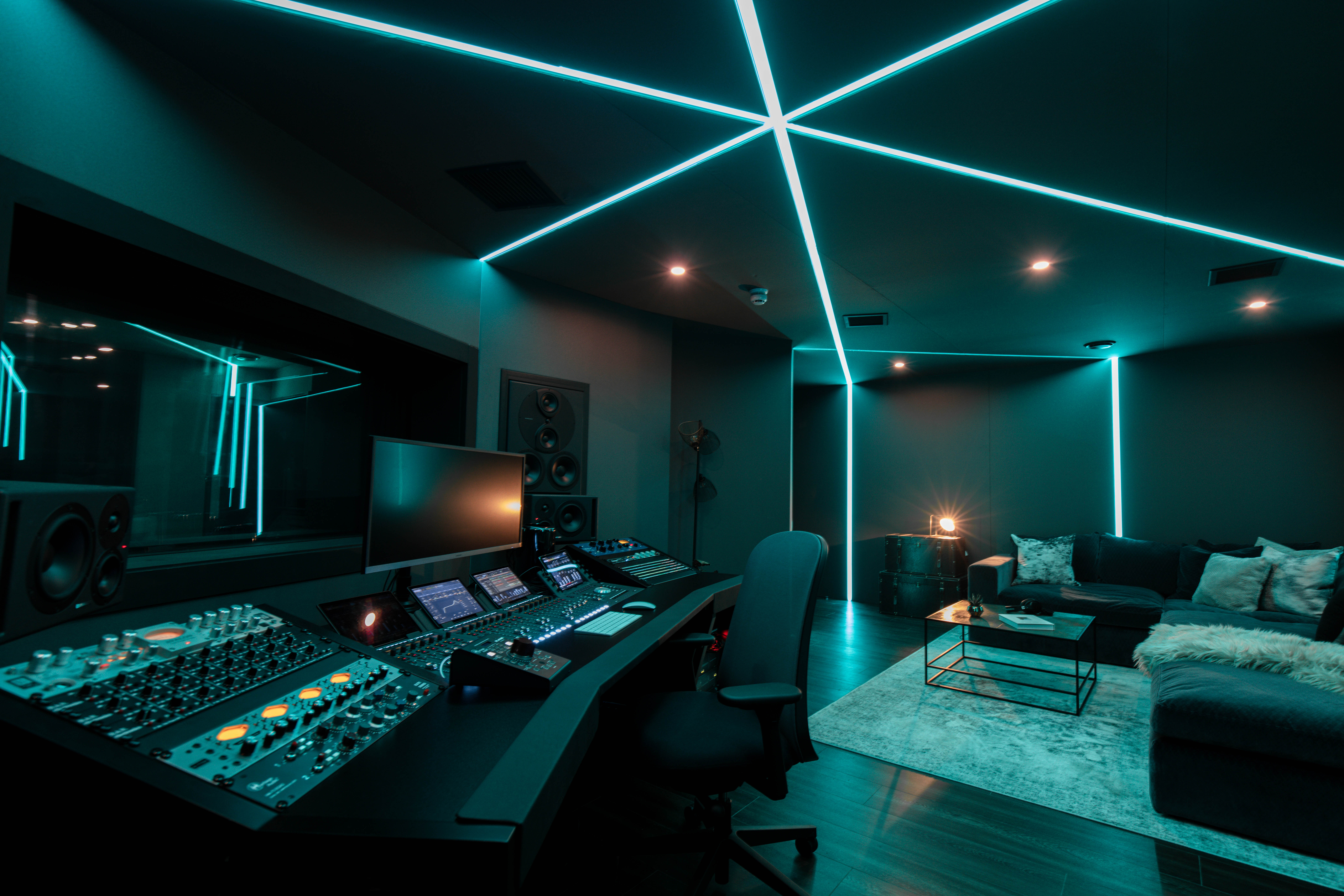 Qube Acton Studio A: Moody creative suite for VIP breakout sessions and high-tech podcast events.