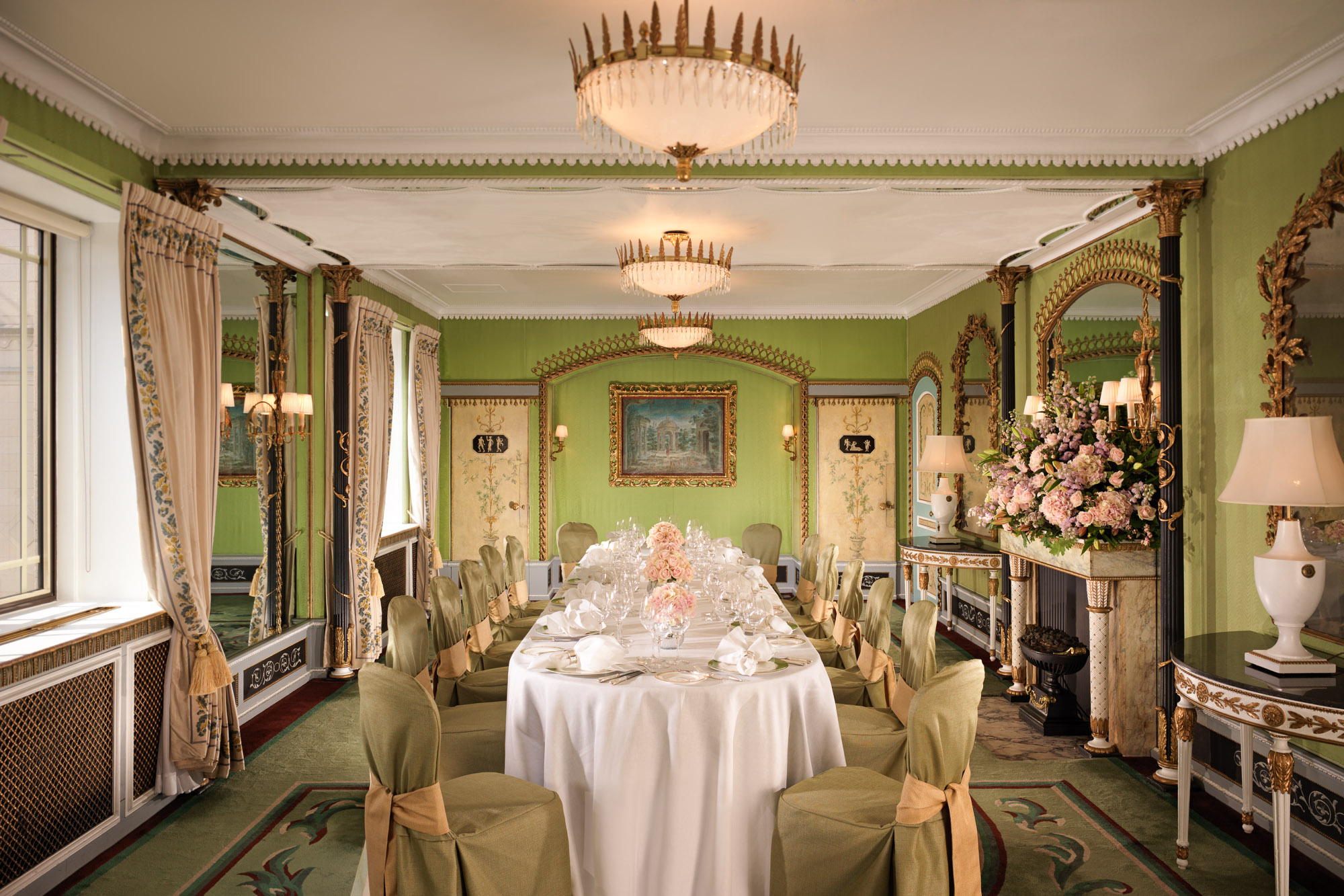 Elegant meeting space at The Dorchester with fine china, ideal for upscale events.