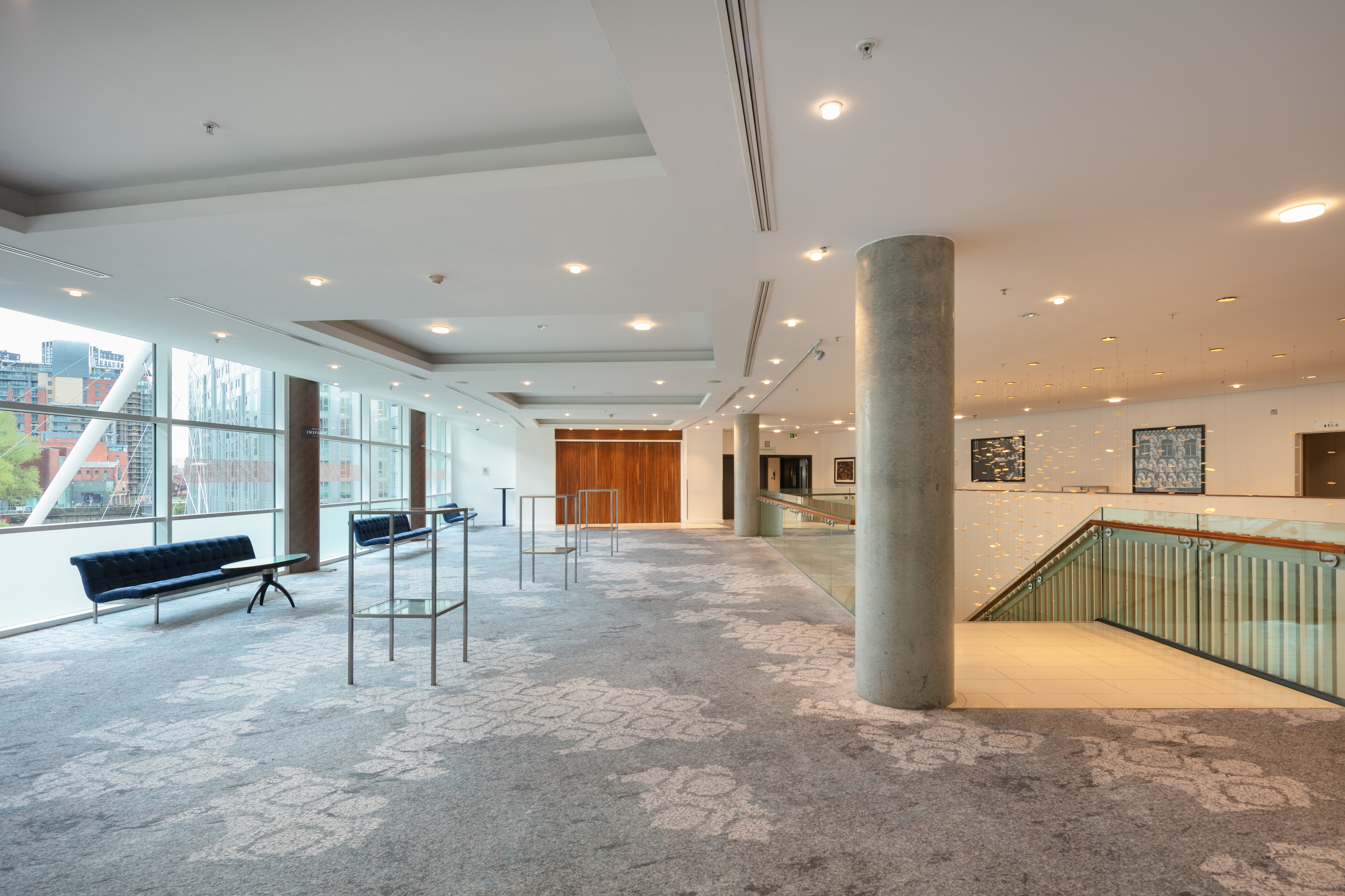 Contemporary pre-function space at The Lowry Hotel for corporate events and wedding receptions.