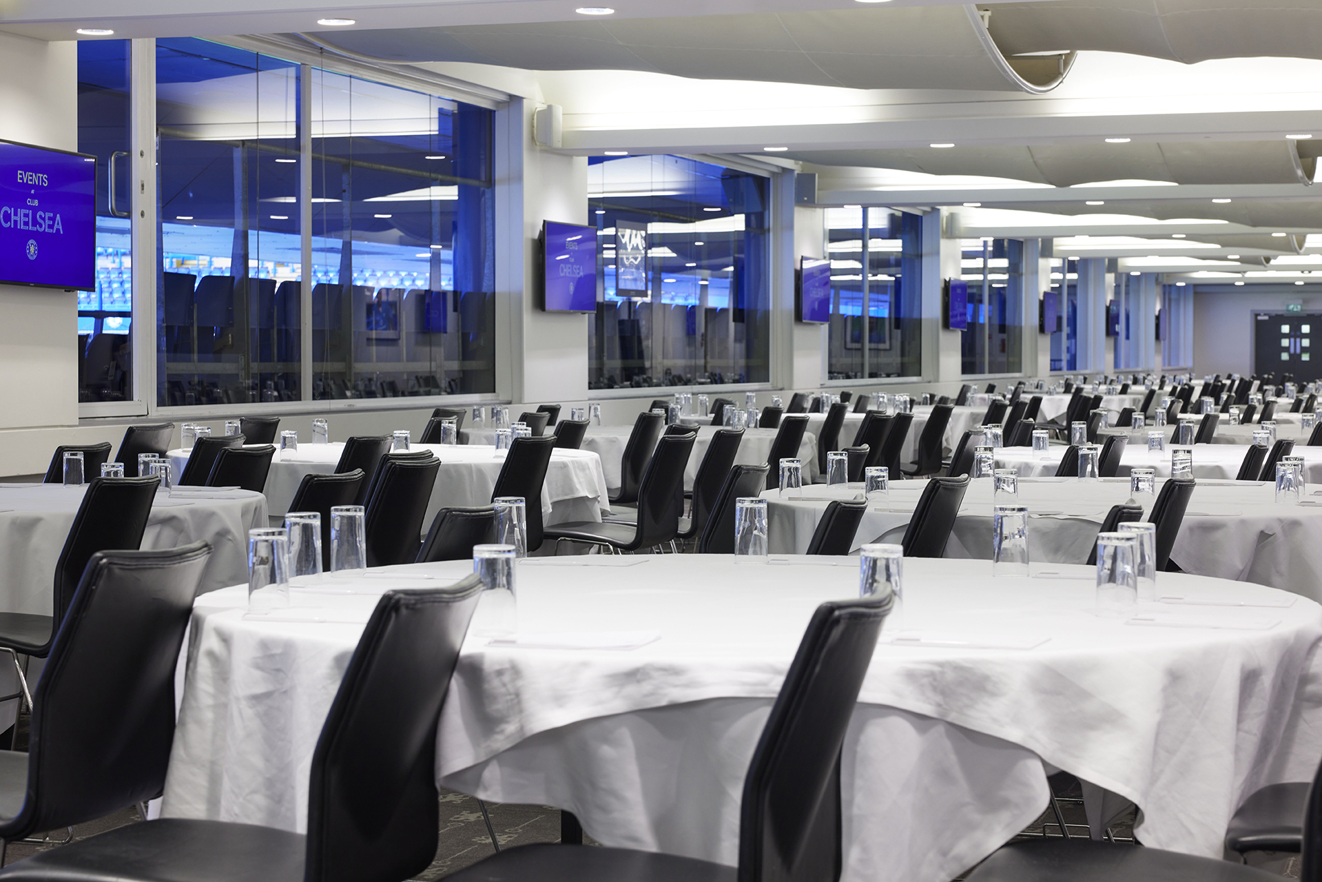 Canoville Suite at Chelsea FC, spacious venue for conferences and banquets with natural light.