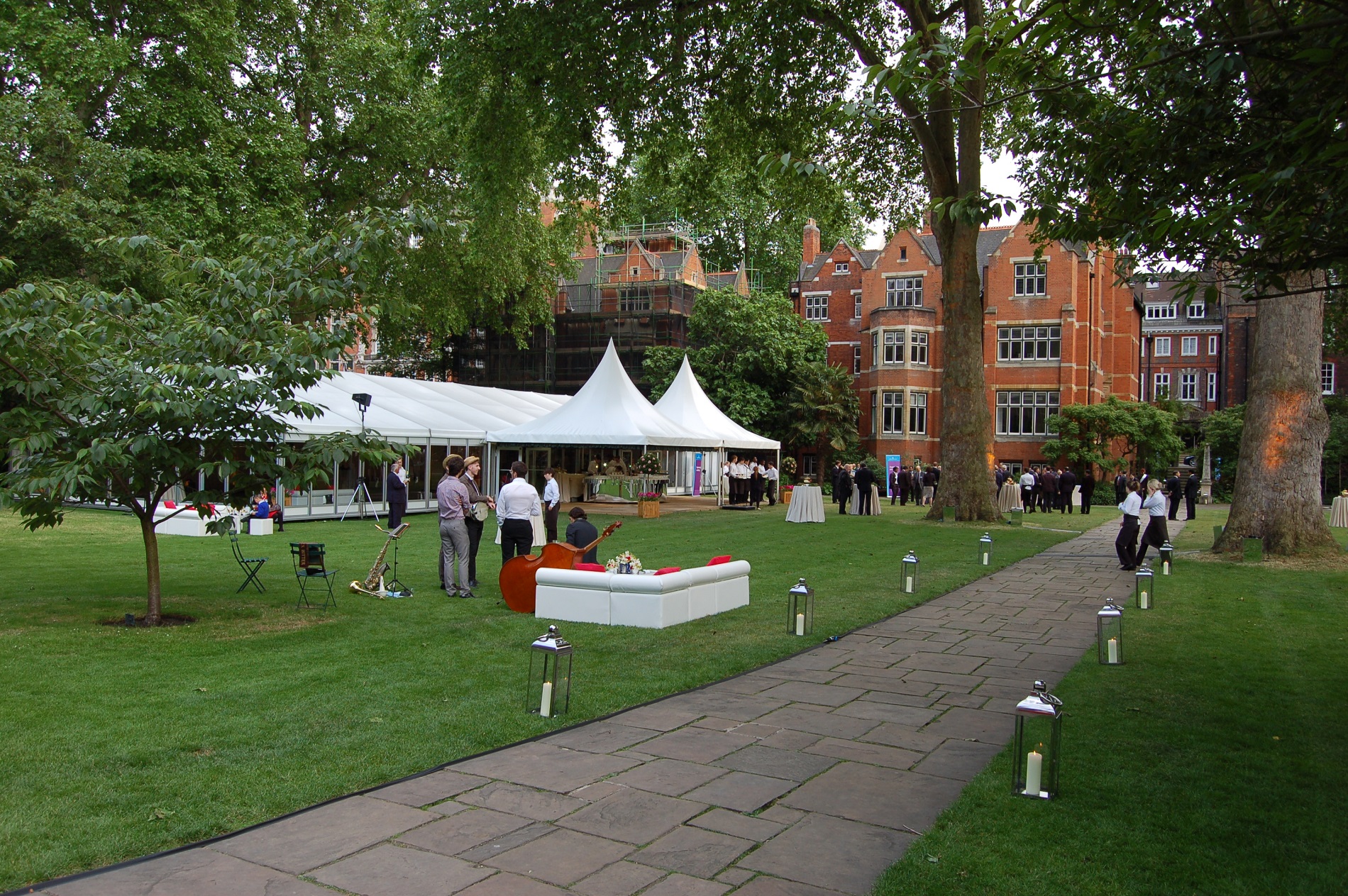 College Garden at Westminster Abbey with a large white tent for elegant outdoor events.
